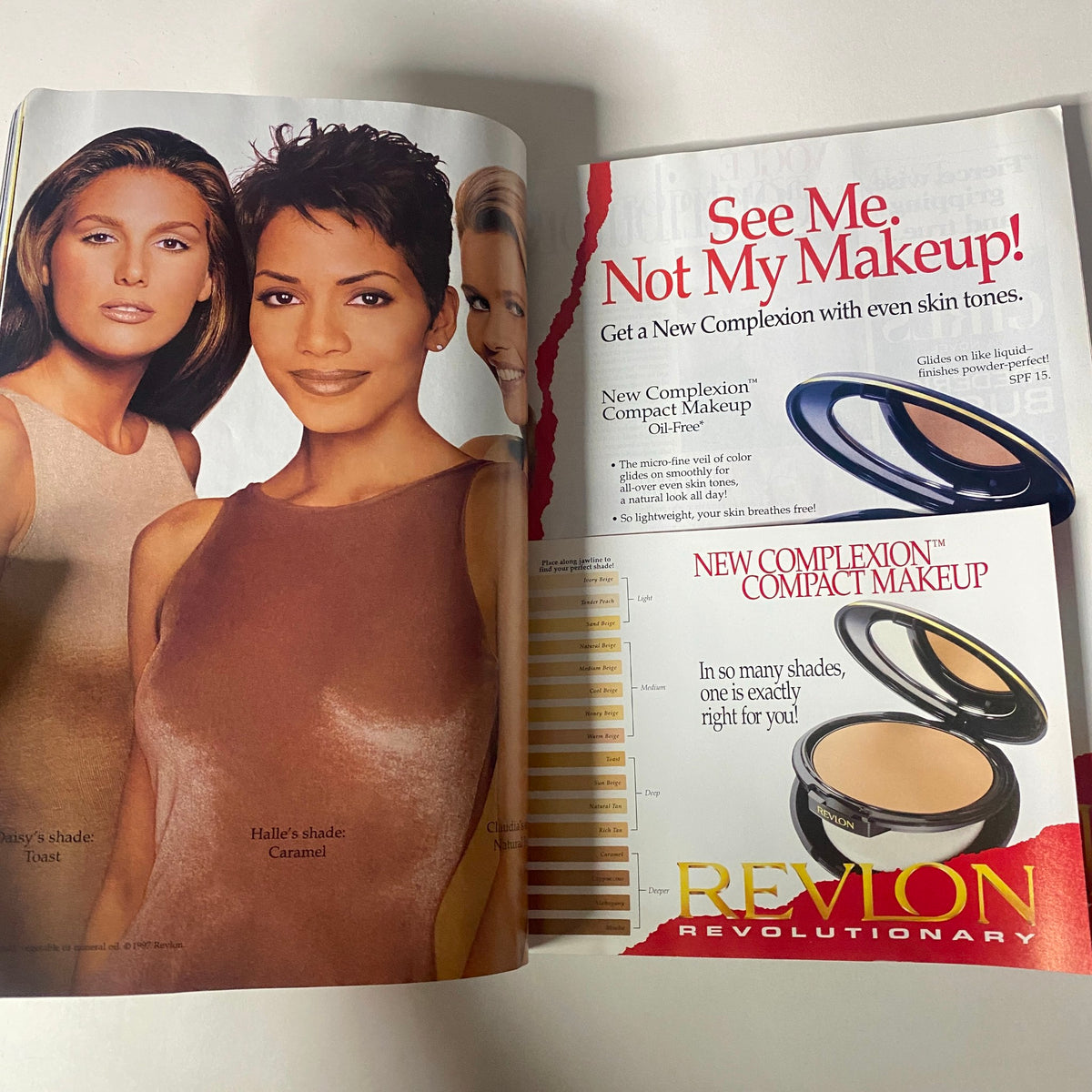 Vogue Magazine June 1997 featuring a Revlon advertisement for the New Complexion Compact Makeup, highlighting shades suitable for diverse skin tones along with a model showcasing the makeup.