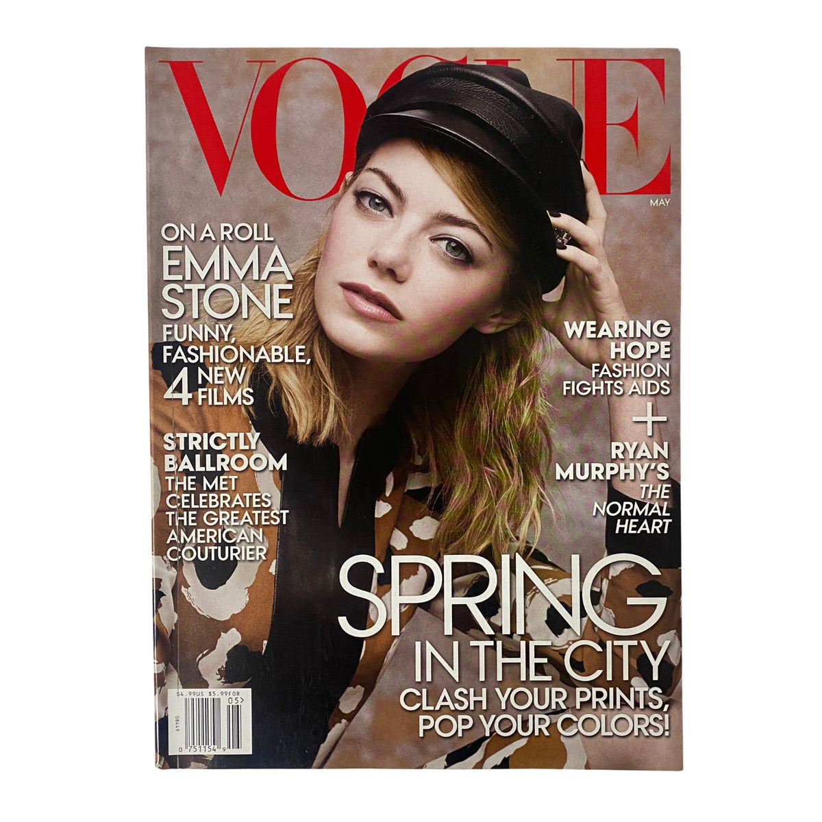 Cover of Vogue Magazine May 2014 featuring Emma Stone photographed by Craig McDean, showcasing the theme 'Spring in the City' with a stylish and contemporary design.