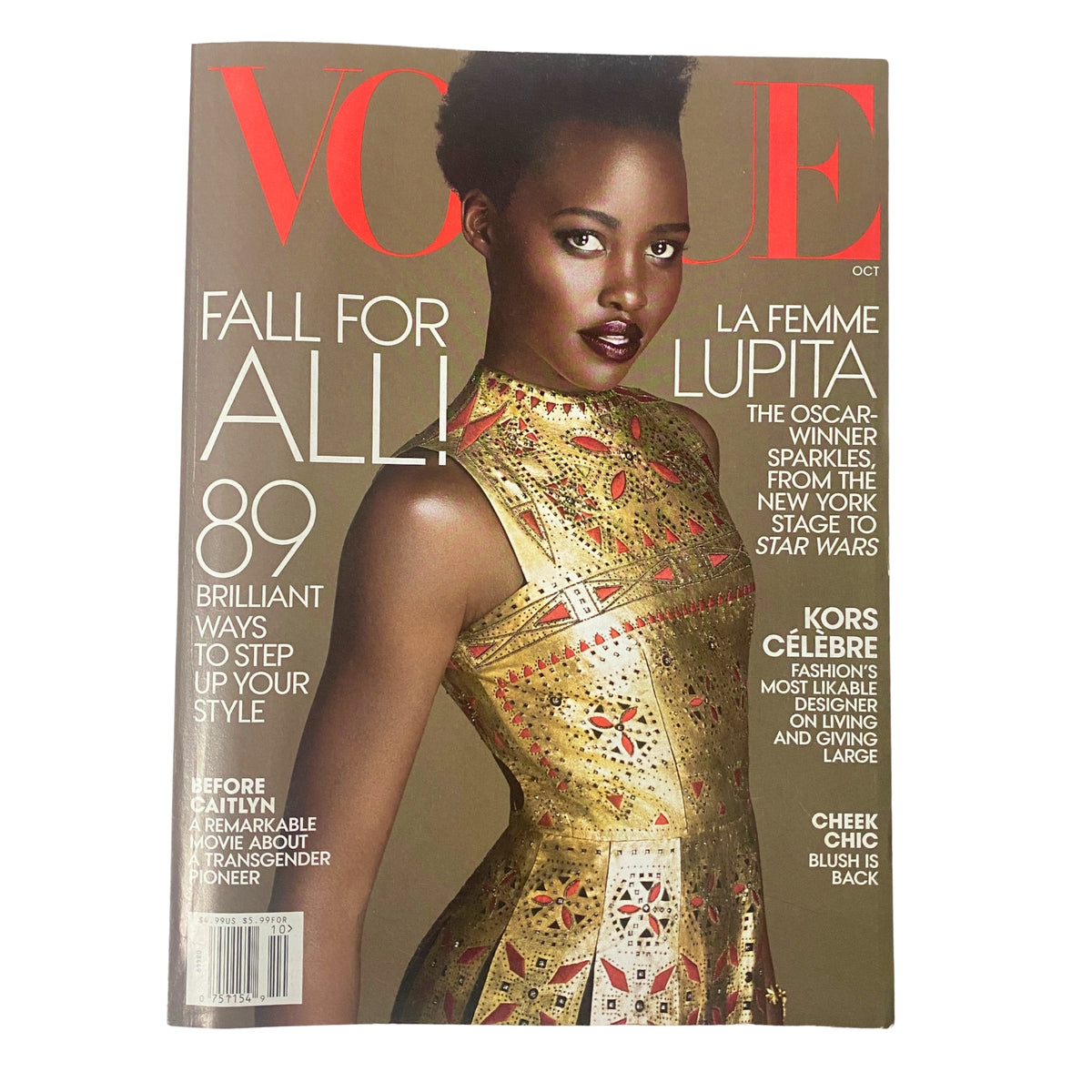 Vogue Magazine October 2015 featuring Lupita Nyong’o on the cover, showcasing her stunning couture dress. Design elements highlight the magazine's fashion theme.