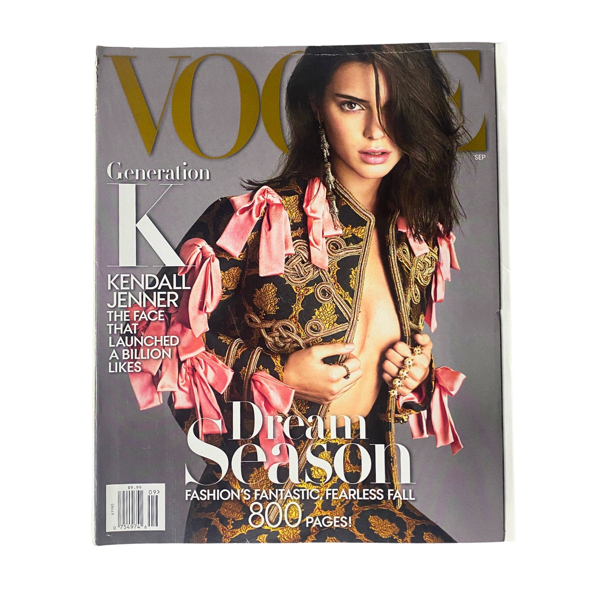 Vogue Magazine September 2016 Kendall Jenner Cover featuring bold fashion and vibrant pink ribbons, highlighting Kendall Jenner as the face that launched a billion likes.