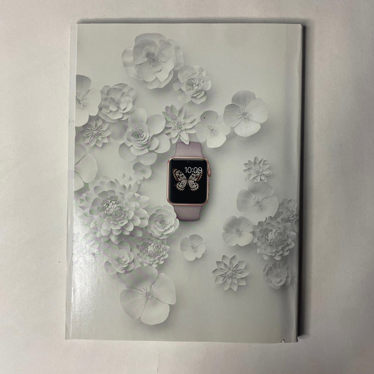 Vogue Magazine April 2016 Rihanna Cover No Label VG showcasing a minimalist floral design with an Apple Watch, emphasizing elegance and contemporary fashion.