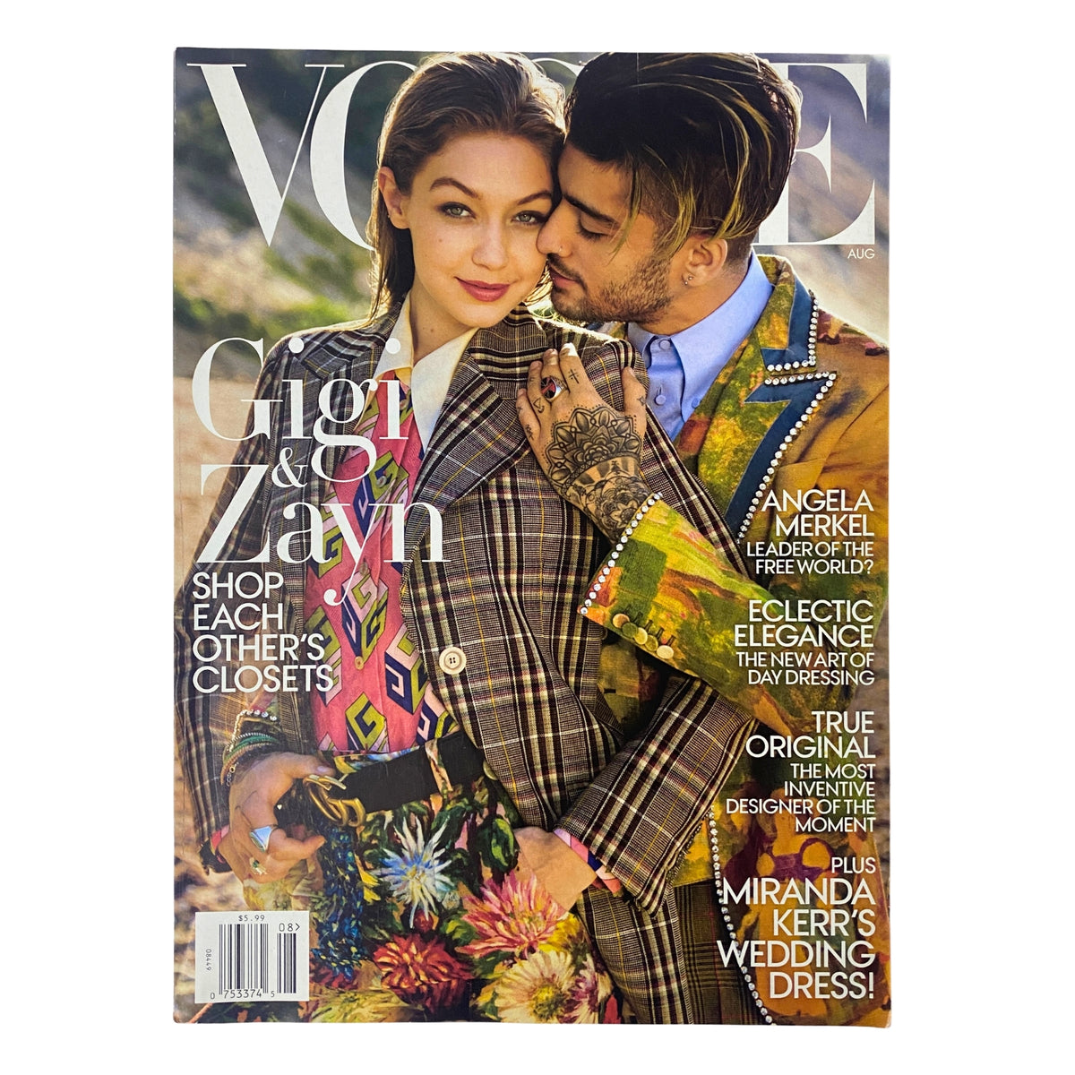 Vogue Magazine August 2017 cover featuring Gigi Hadid and Zayn Malik, showcasing bold fashion and gender fluidity. In very good condition with minor wear.