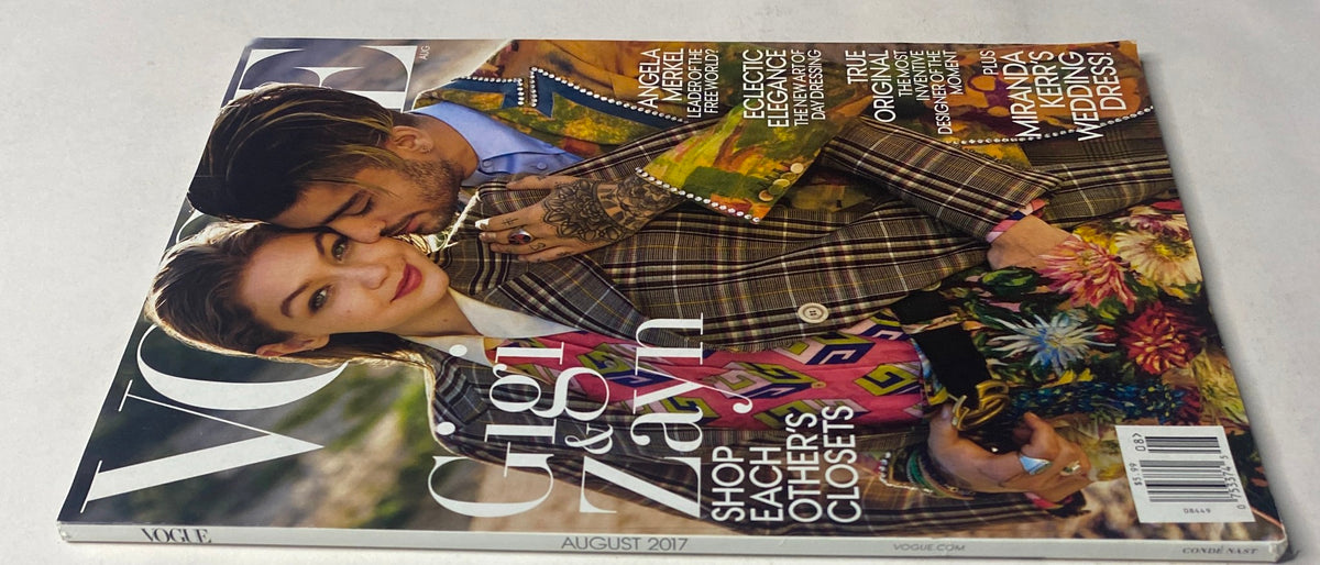 Side view of Vogue Magazine August 2017 featuring Gigi Hadid and Zayn Malik on the cover, with details on articles such as 'Angela Merkel: Leader of the Free World?' and 'Miranda Kerr's Wedding Dress'.