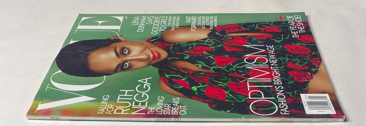 Close-up of Vogue Magazine January 2017 with Ruth Negga cover, emphasizing her striking pose and vibrant floral attire, reflecting modern fashion trends.