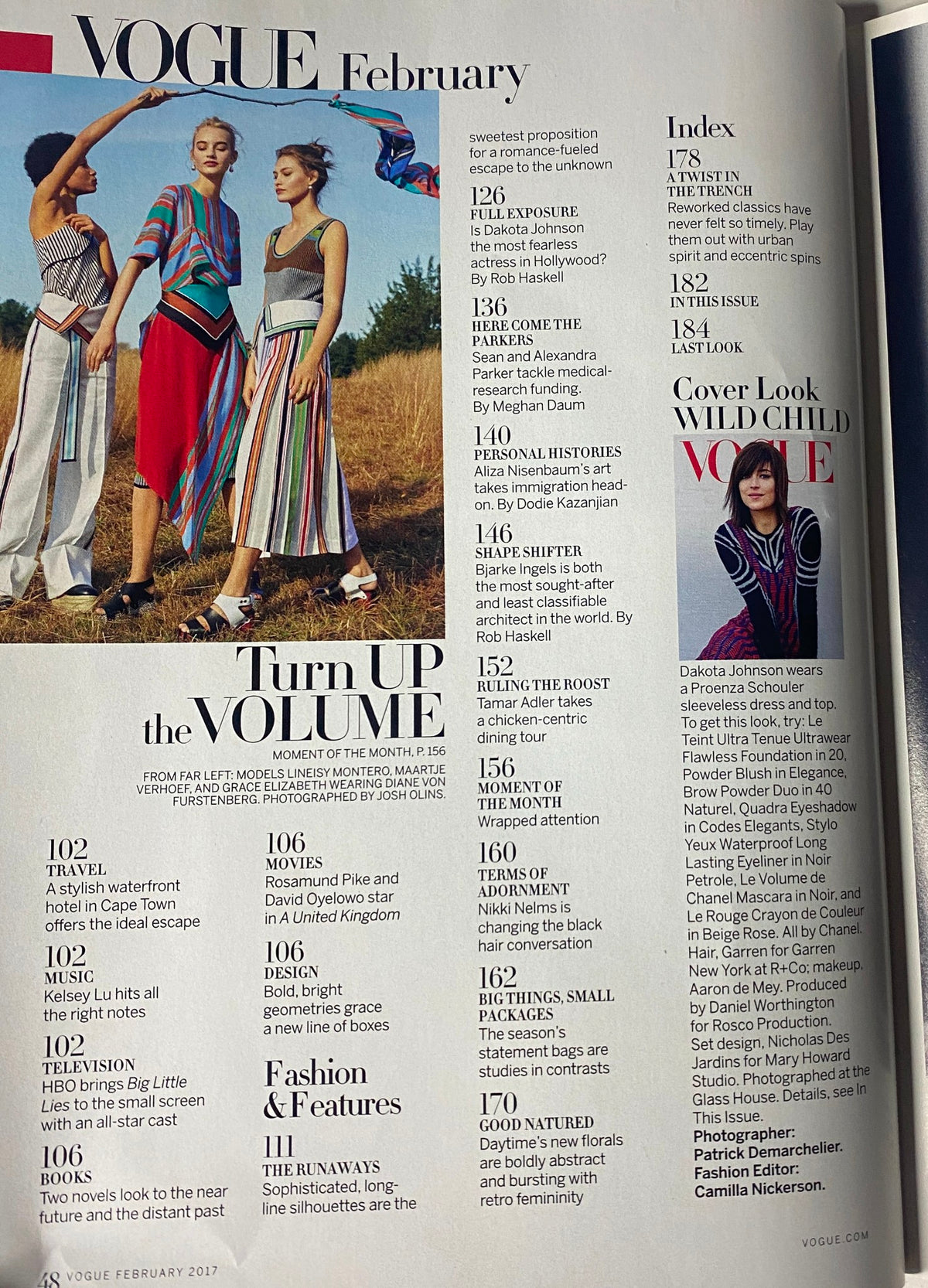 Vogue Magazine February 2017 Dakota Johnson Cover featuring a fashion spread with bold colors and patterns. The table of contents highlights notable articles and features.
