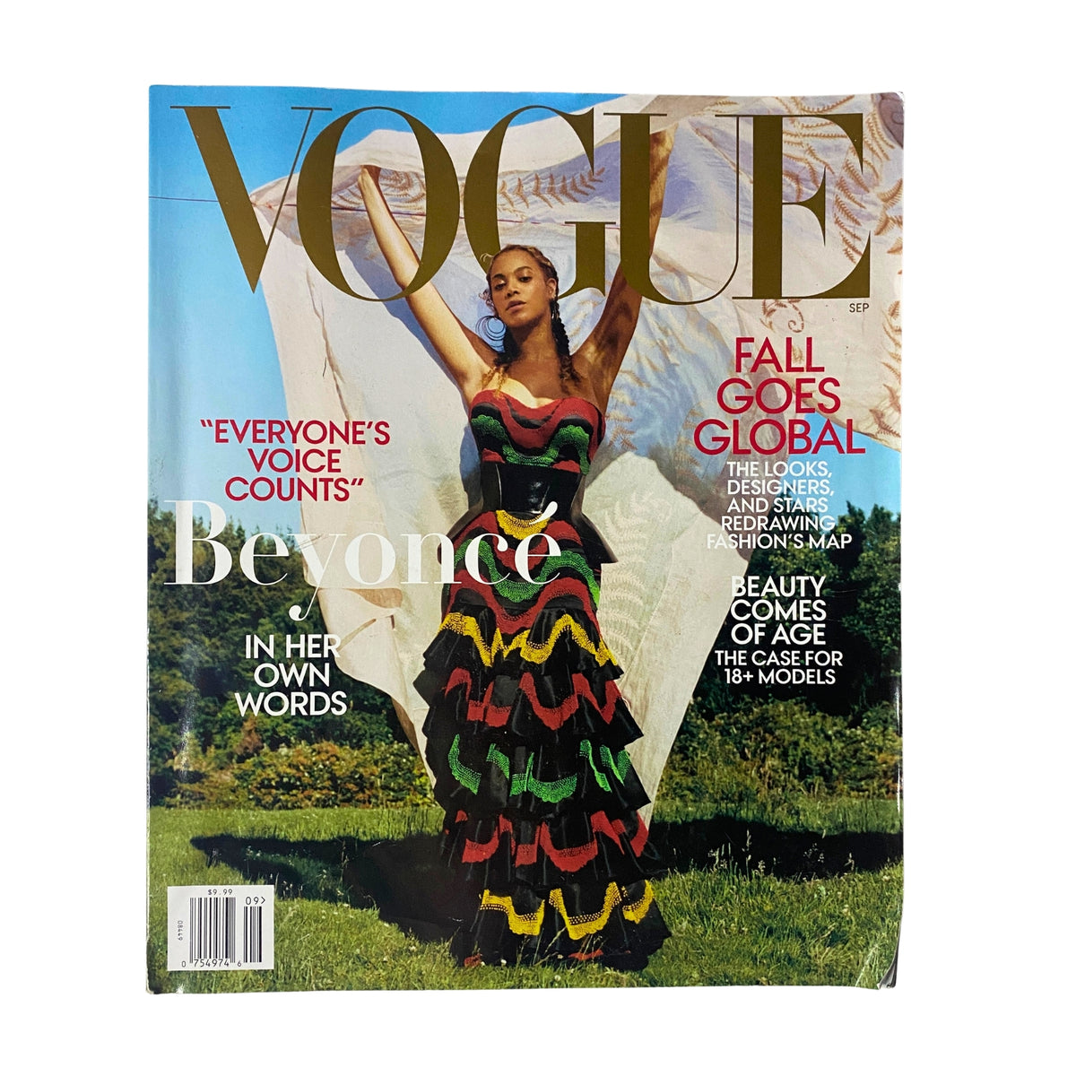 Vogue Magazine September 2018 Beyoncé Cover No Label showcasing Beyoncé in a vibrant dress, emphasizing the theme 'Everyone's Voice Counts'. The cover captures a striking outdoor image with the text about global fashion and beauty.