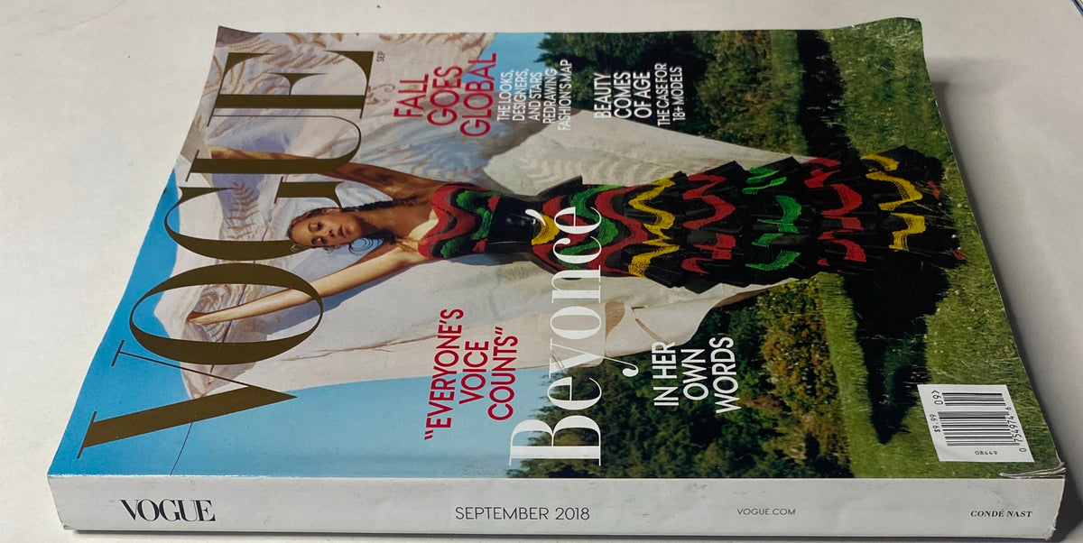 Vogue Magazine September 2018 Beyoncé Cover No Label highlighting Beyoncé in a colorful gown, with details on the magazine's focus on global fashion trends. The cover text includes 'Fall Goes Global' and 'Beyoncé in Her Own Words'.