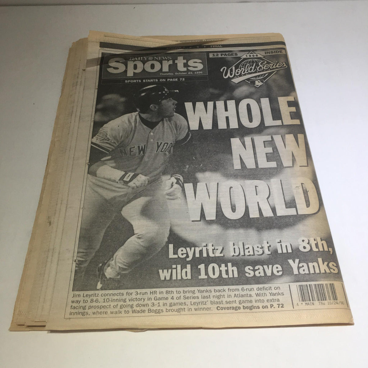 Back page of the NY Daily News sports section presenting 'Whole New World' capturing Jim Leyritz's critical performance and game highlights from the World Series.