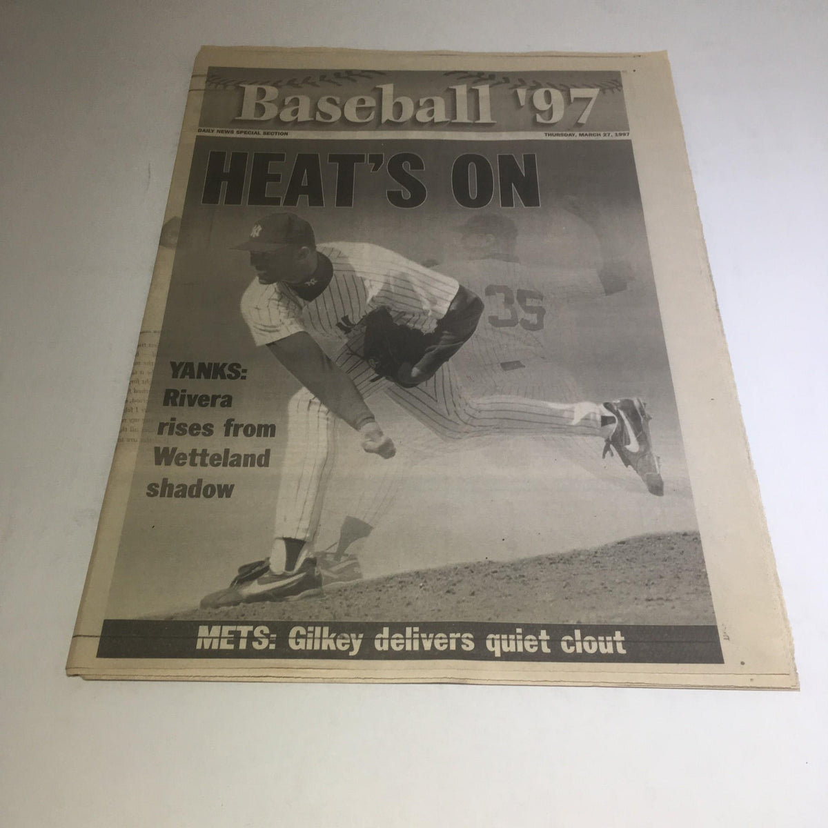 NY Daily News cover from March 27, 1997, titled 'Heat's On Mets: Gilkey Delivers Quiet Clout' featuring a baseball player in action.