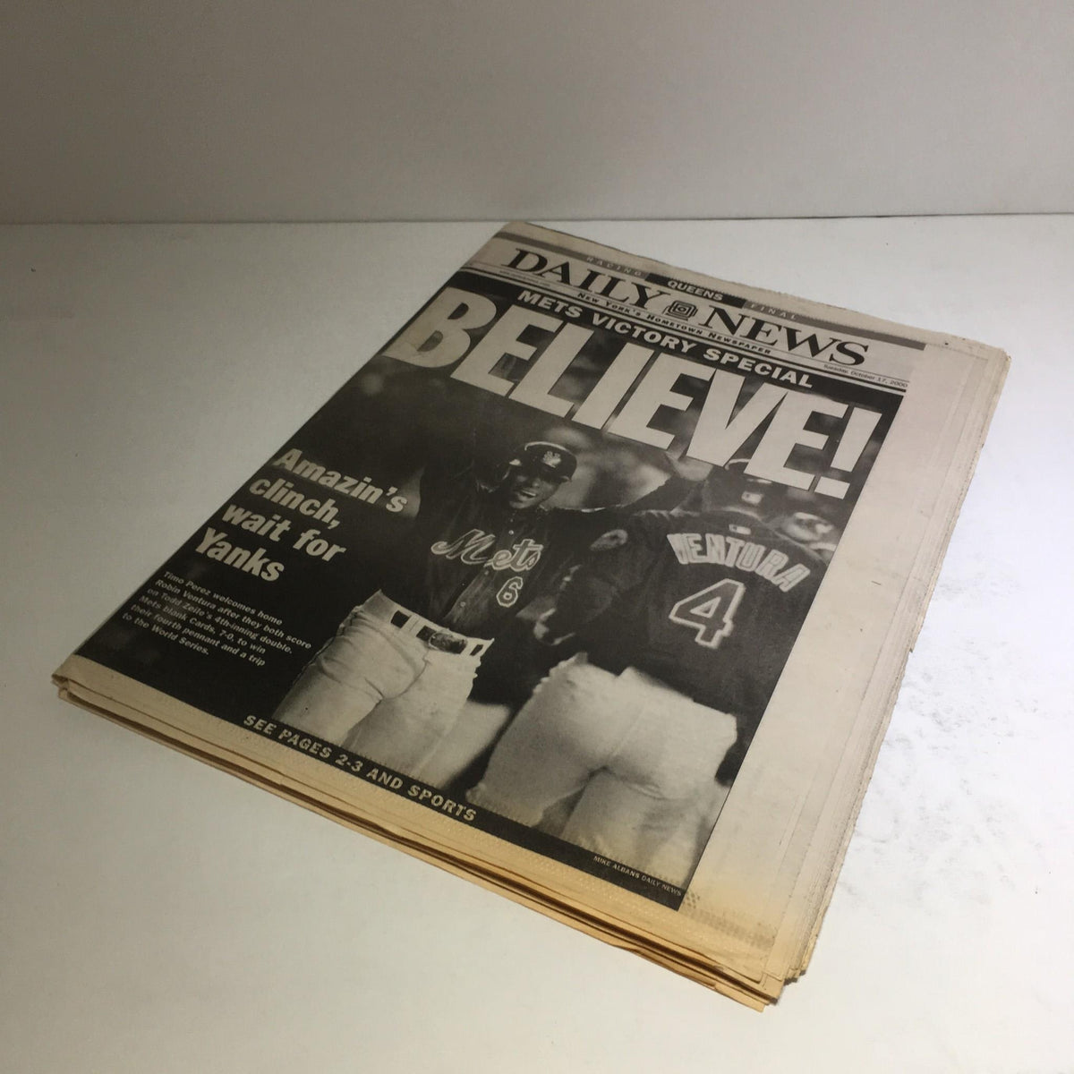 NY Daily News front page, October 17, 2000, with the headline 'Believe! Amazin's clinch, wait for Yanks'. The image illustrates the excitement surrounding the Mets' achievement, highlighting key player moments.