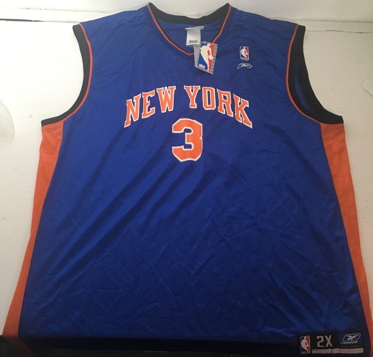 NBA New York Knicks Stephon Marbury #3 jersey size 2XL, featuring blue fabric with orange accents and the player's number prominently displayed.