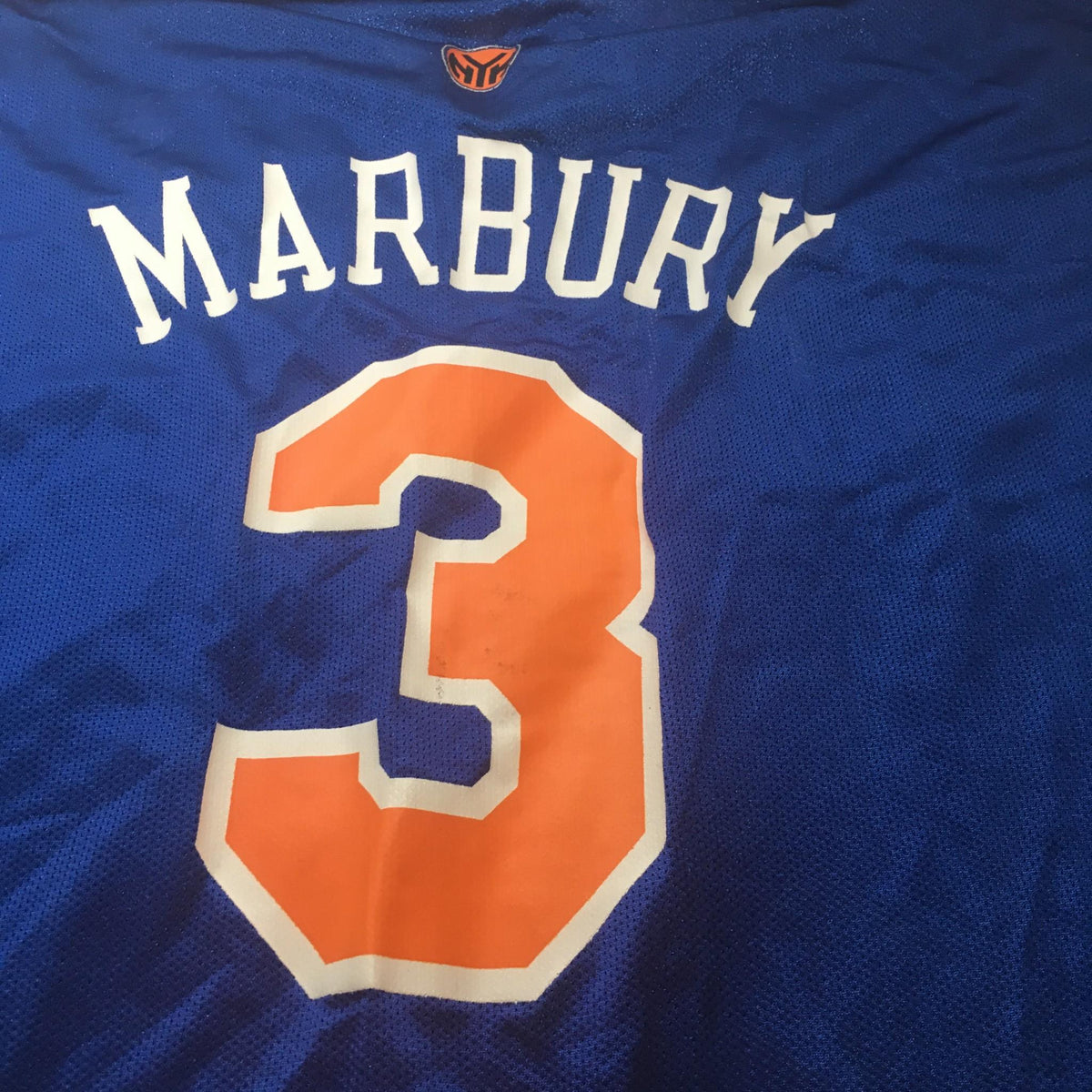Close-up of the back detail of NBA New York Knicks Stephon Marbury #3 Jersey Size 2XL featuring player name and number