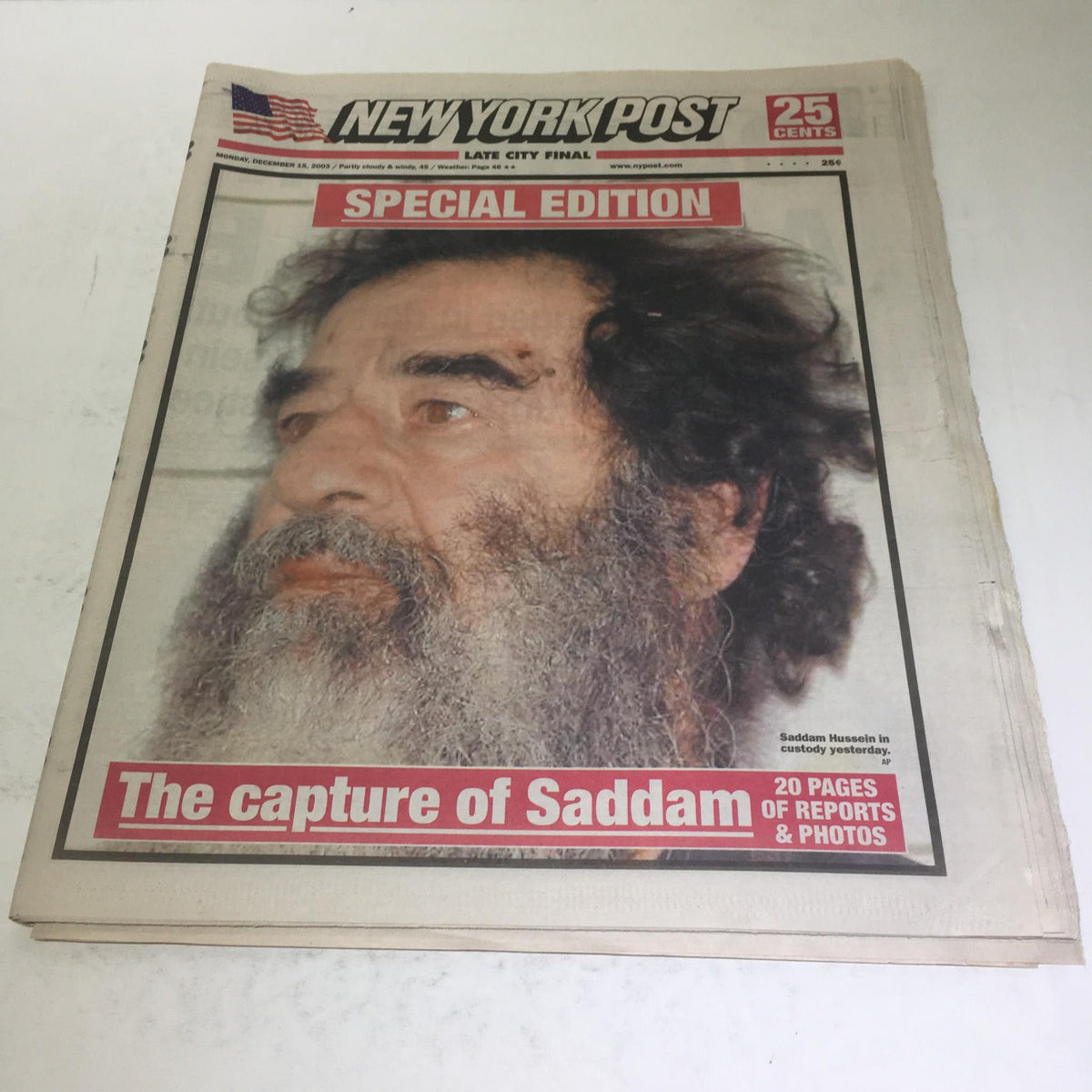 New York Post front cover from December 15, 2003, highlighting the special edition on the capture of Saddam Hussein, featuring his portrait with a prominent headline.