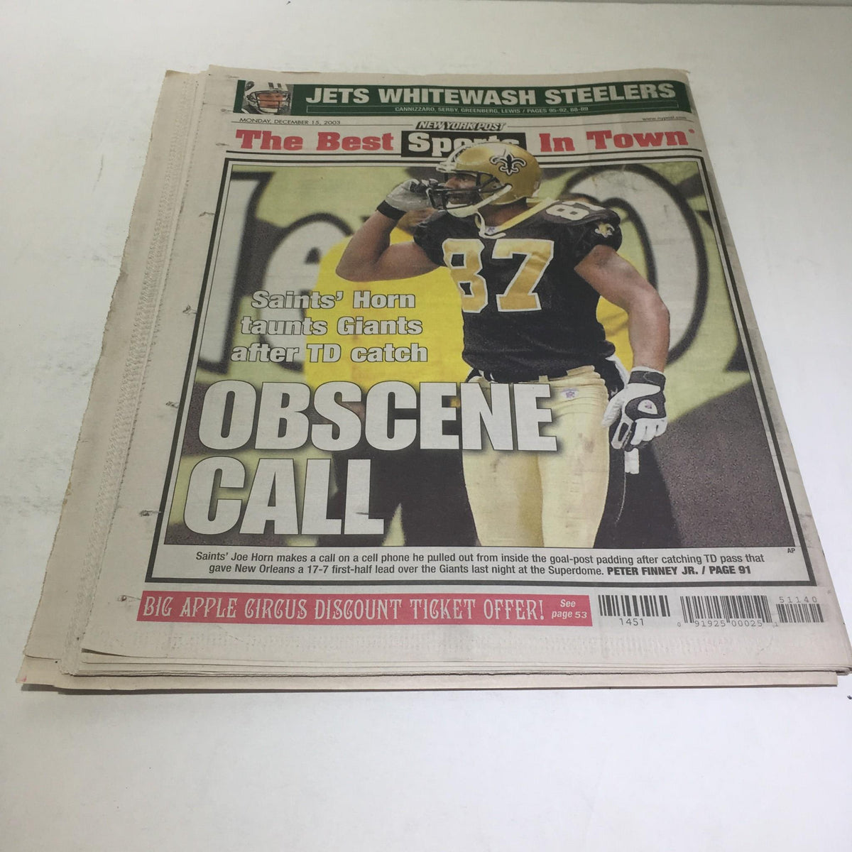 Vintage New York Post cover featuring NFL player Horn taunting Giants after a touchdown, illustrating sports journalism during an important game.