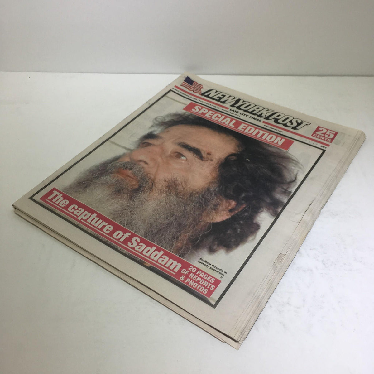 New York Post Special Edition cover from December 15, 2003, documenting the capture of Saddam Hussein, showcasing a significant historical moment.