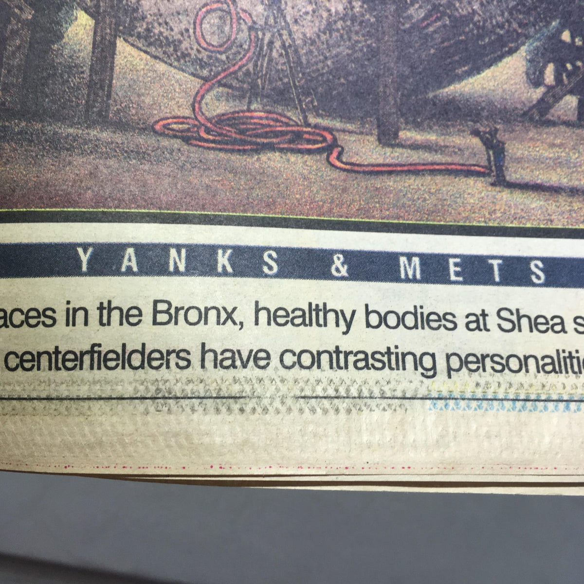 Close-up of the text on New York Newsday: April 4 1993 Baseball '93 highlighting Yanks and Mets, emphasizing the rivalry between New York baseball teams.