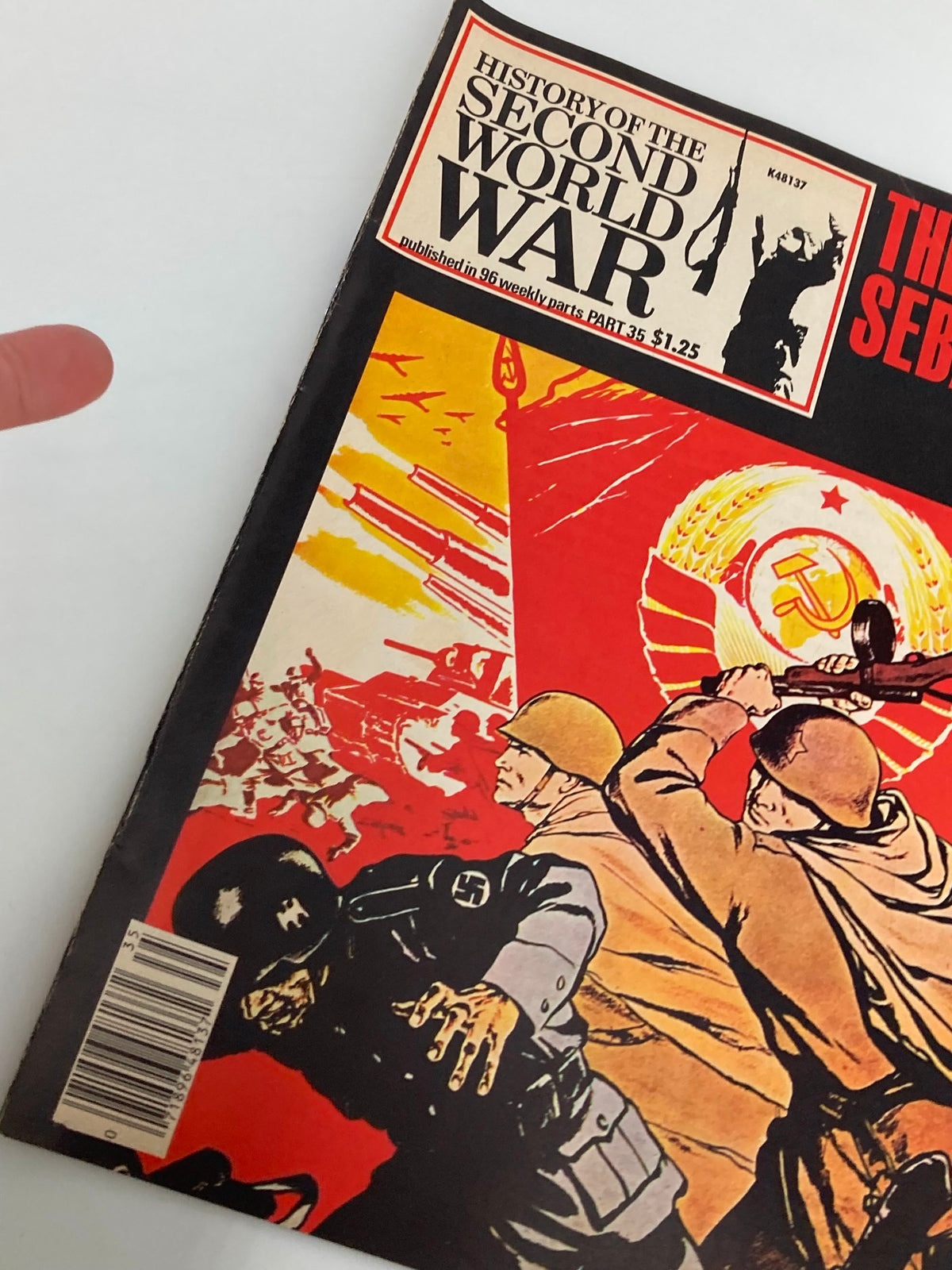 Close-up of the cover of the vintage magazine 'History of the Second World War Part 35: The Siege of Sebastopol', highlighting its compelling design and details.