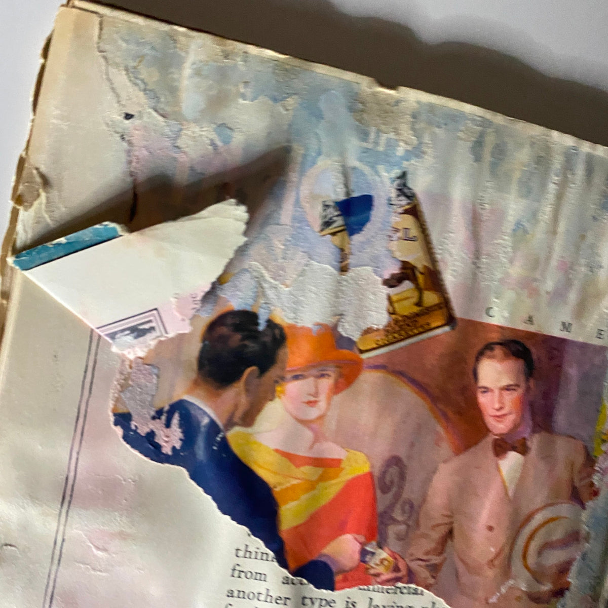 Close-up of a damaged back cover from The New Yorker Complete Magazine April 23, 1927 depicting vibrant illustrations and torn edges.