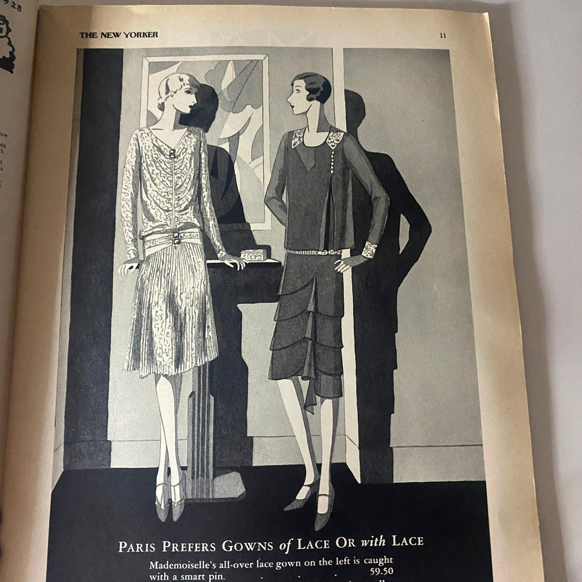 The New Yorker Complete Magazine March 17, 1928 - Advertisement featuring elegant women's fashion with two models showcasing gowns, highlighting the style trends of the 1920s.