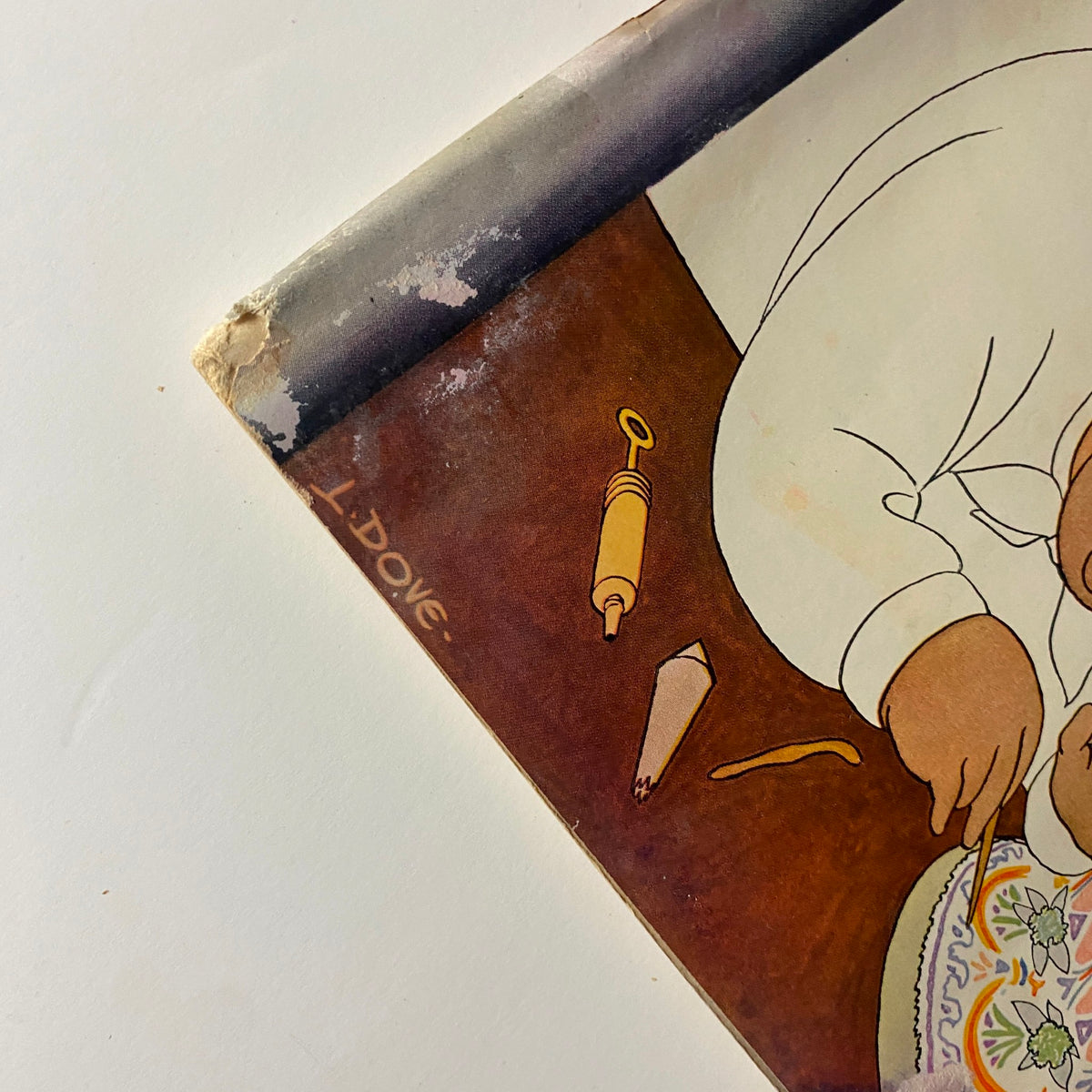 Cover detail of The New Yorker Complete Magazine May 5, 1928 featuring the signature of artist Leonard Dove on the lower left corner.