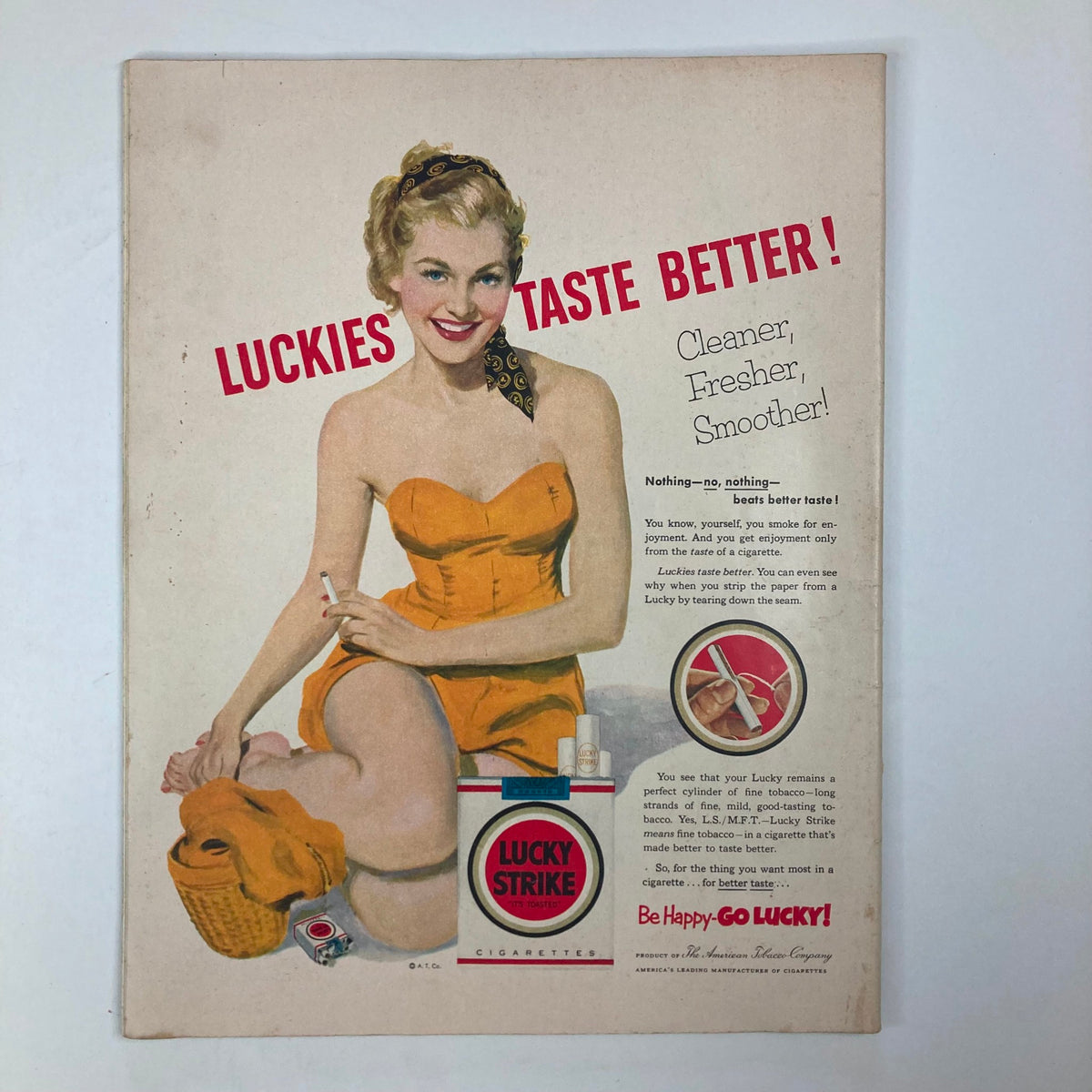 Vintage advertisement from VTG Collier's Magazine July 25, 1953 promoting Lucky Strike cigarettes, featuring a glamorous woman in a swimsuit, illustrating 1950s advertising trends.