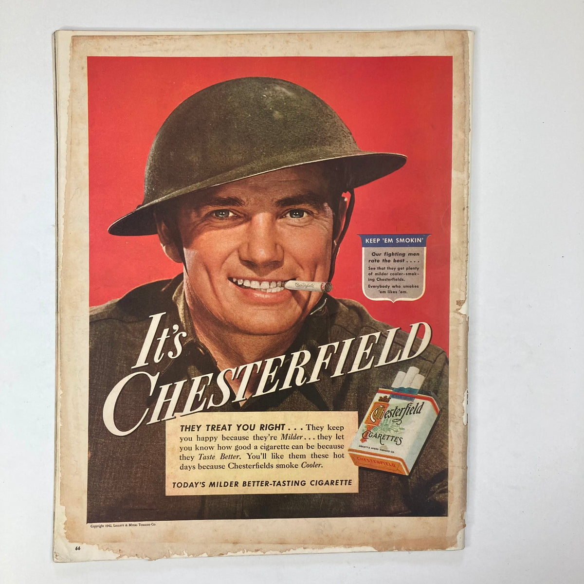 Advertisement in Collier's Magazine from August 15, 1942, featuring a smiling soldier promoting Chesterfield cigarettes.