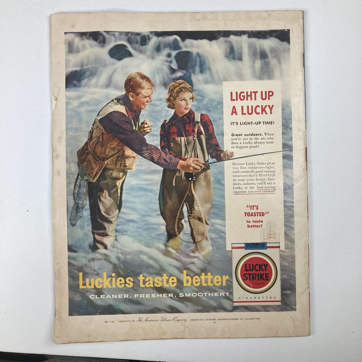 Cover of the VTG Collier's Magazine, April 27, 1956, Volume 137, No. 9, featuring an advertisement for Lucky Strike cigarettes with models by a waterfall.