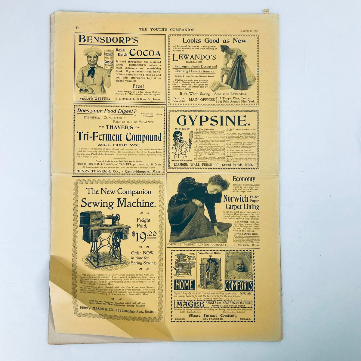 Advertisement page from VTG The Youth's Companion Magazine, March 26, 1896, featuring various products and services, including a sewing machine and cocoa brand.