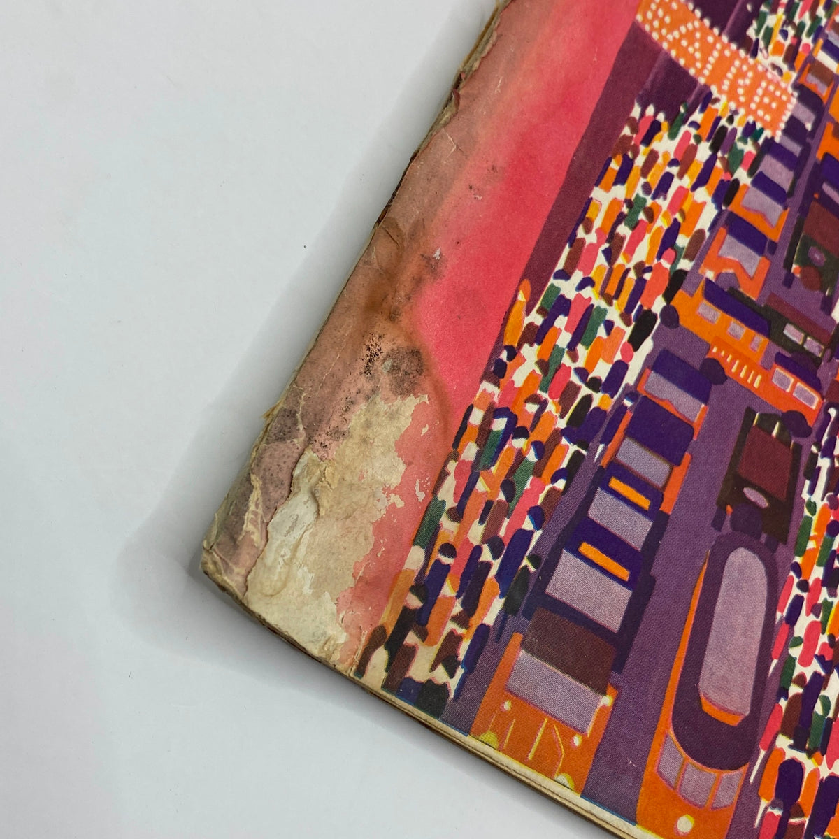Close-up of the cover of The New Yorker Magazine March 10, 1928 featuring Ilonka Karasz's vibrant artwork, showcasing wear and tear typical for its age.