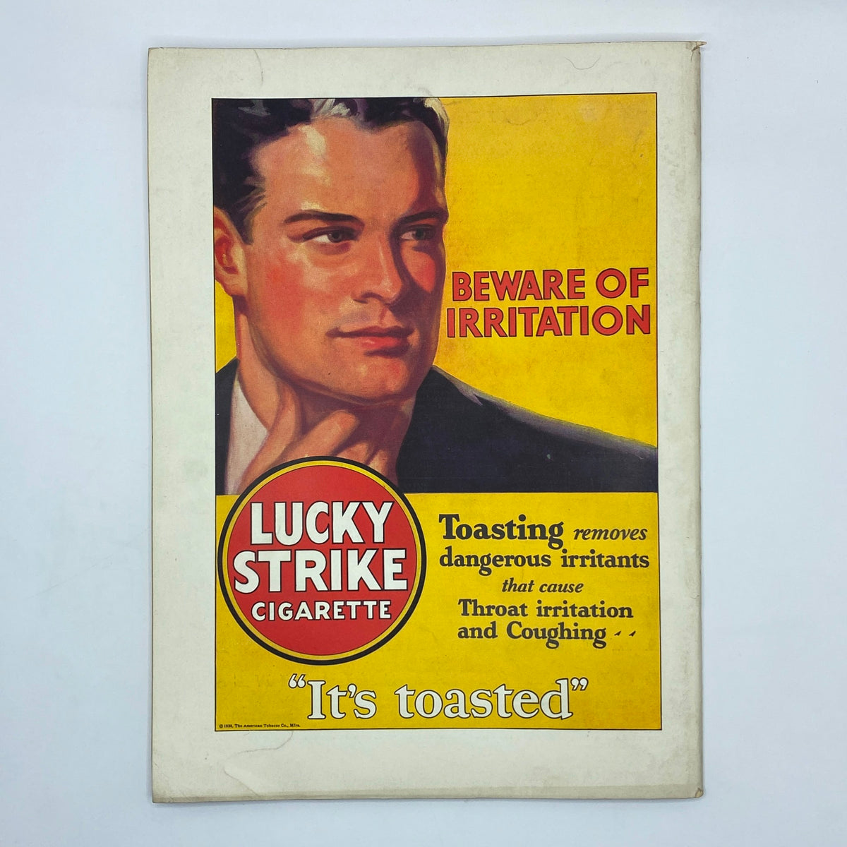 Vintage advertisement for Lucky Strike Cigarettes featuring a handsome man with the caption 'Beware of Irritation'. Known for its slogan 'It's toasted', this ad exemplifies early 20th-century marketing from The New Yorker, November 8, 1930.