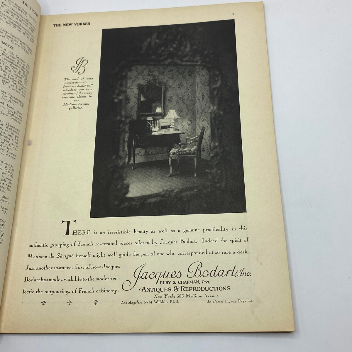 Inside advertisement page from The New Yorker Complete Magazine July 26, 1930, presenting antique furniture by Jacques Bodart, showcasing a classic desk and chair.