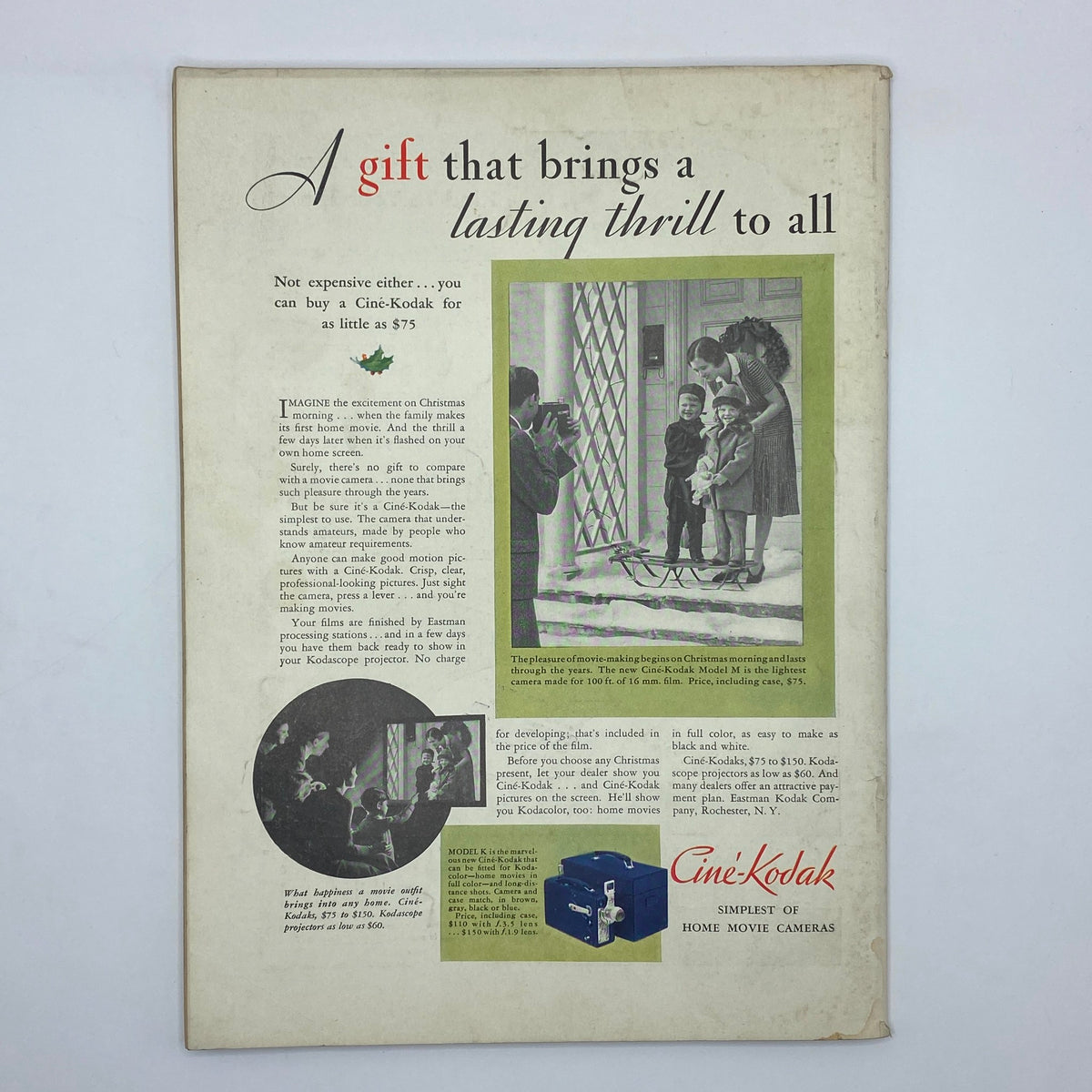 Vintage advertisement from The New Yorker magazine, December 6, 1930, promoting the Cine-Kodak camera as an ideal Christmas gift. It includes an image of a family enjoying movie-making, reflecting the era's family values and technology.