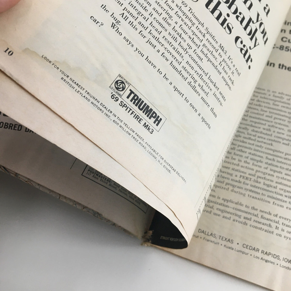 Another interior page of Newsweek Magazine July 21 1969 showcasing an advertisement for the 1969 Triumph Spitfire MK3. Highlighting aspects of life and automobiles during the Apollo 11 era.