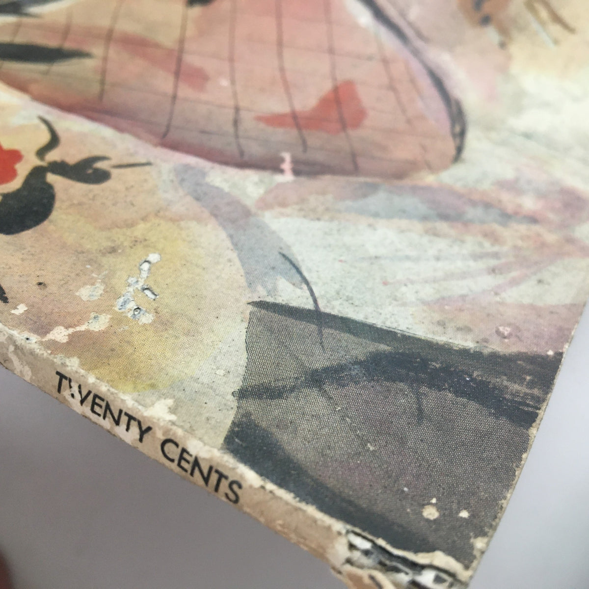 Close-up view of the edge of Mademoiselle Magazine September 1935 showing minor wear and the text 'TWENTY CENTS', depicting vintage magazine condition.