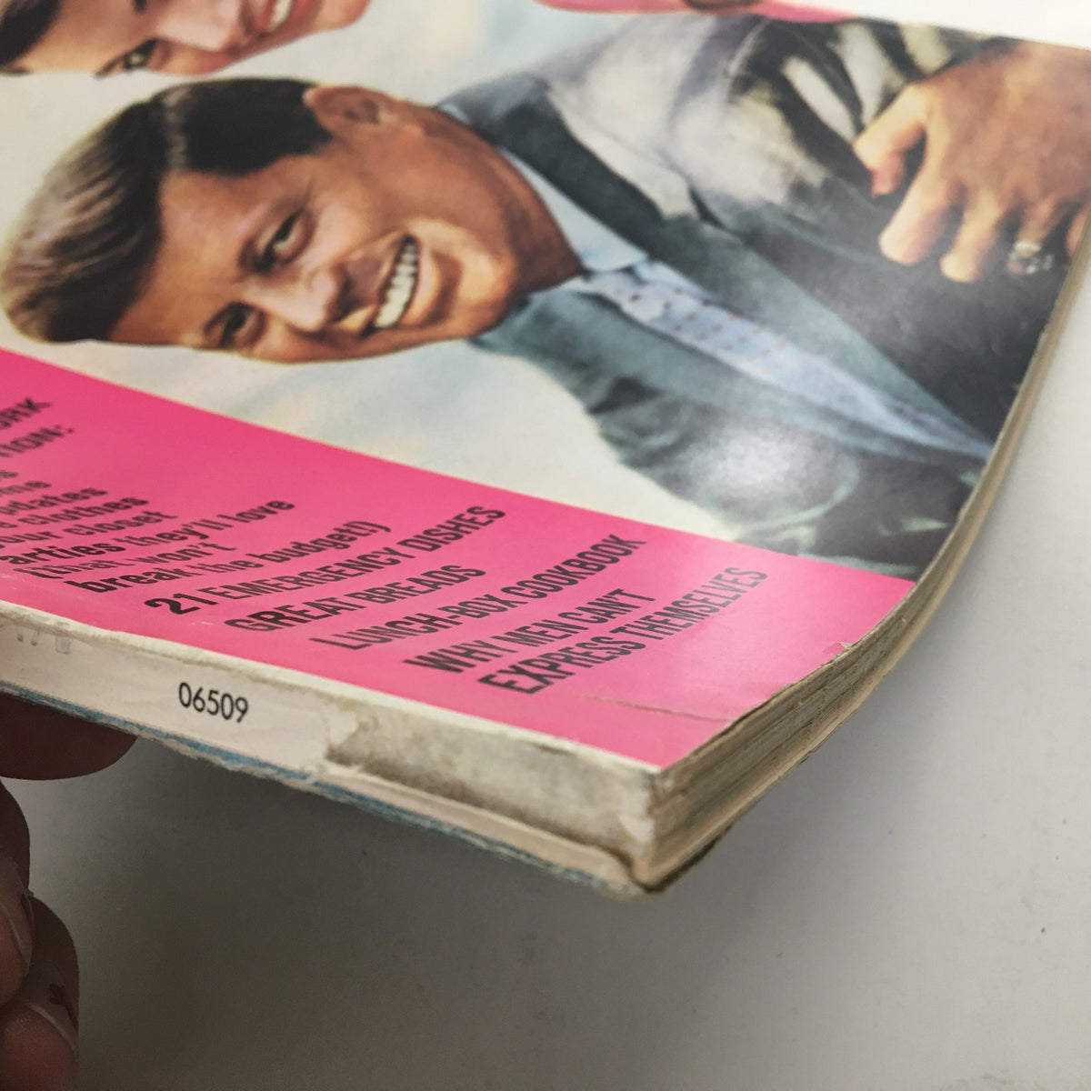 Side view of Woman's Day Magazine April 1974, highlighting the quality and minor wear typical for vintage magazines, featuring John F. Kennedy and Jacqueline Kennedy.