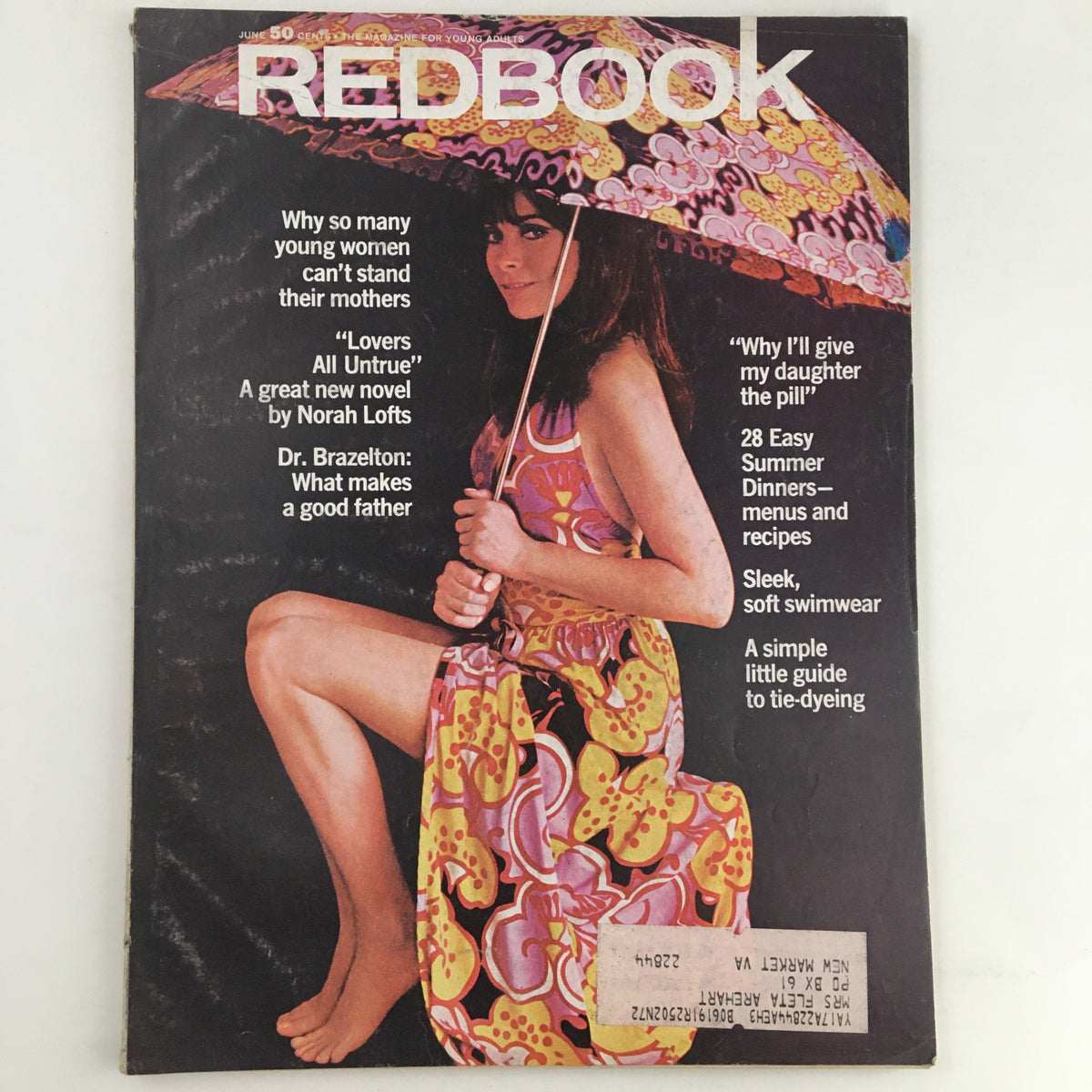 Redbook Magazine June 1970 cover featuring Marianne Nestor in a colorful beach wardrobe, holding an umbrella, highlighting articles about women's issues and summer fashion.