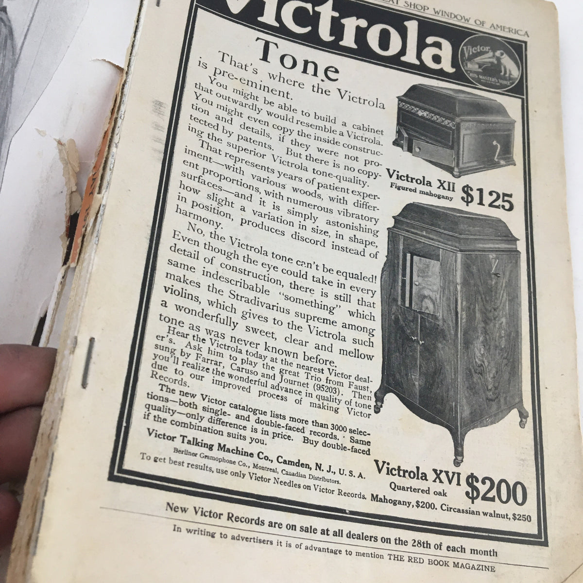 Ad for Victrola showcasing prices and features in The Redbook Magazine May 1910 edition.