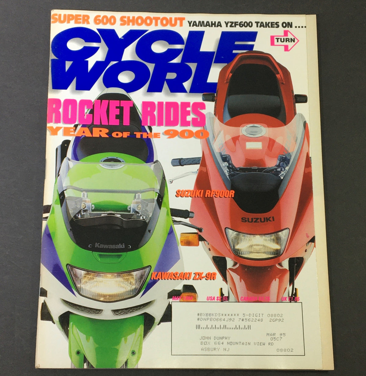 Cycle World Magazine May 1994 cover featuring Suzuki RF900R and Kawasaki ZX-9R motorcycles, showcasing vibrant colors and bold graphics celebrating the performance of these iconic bikes.