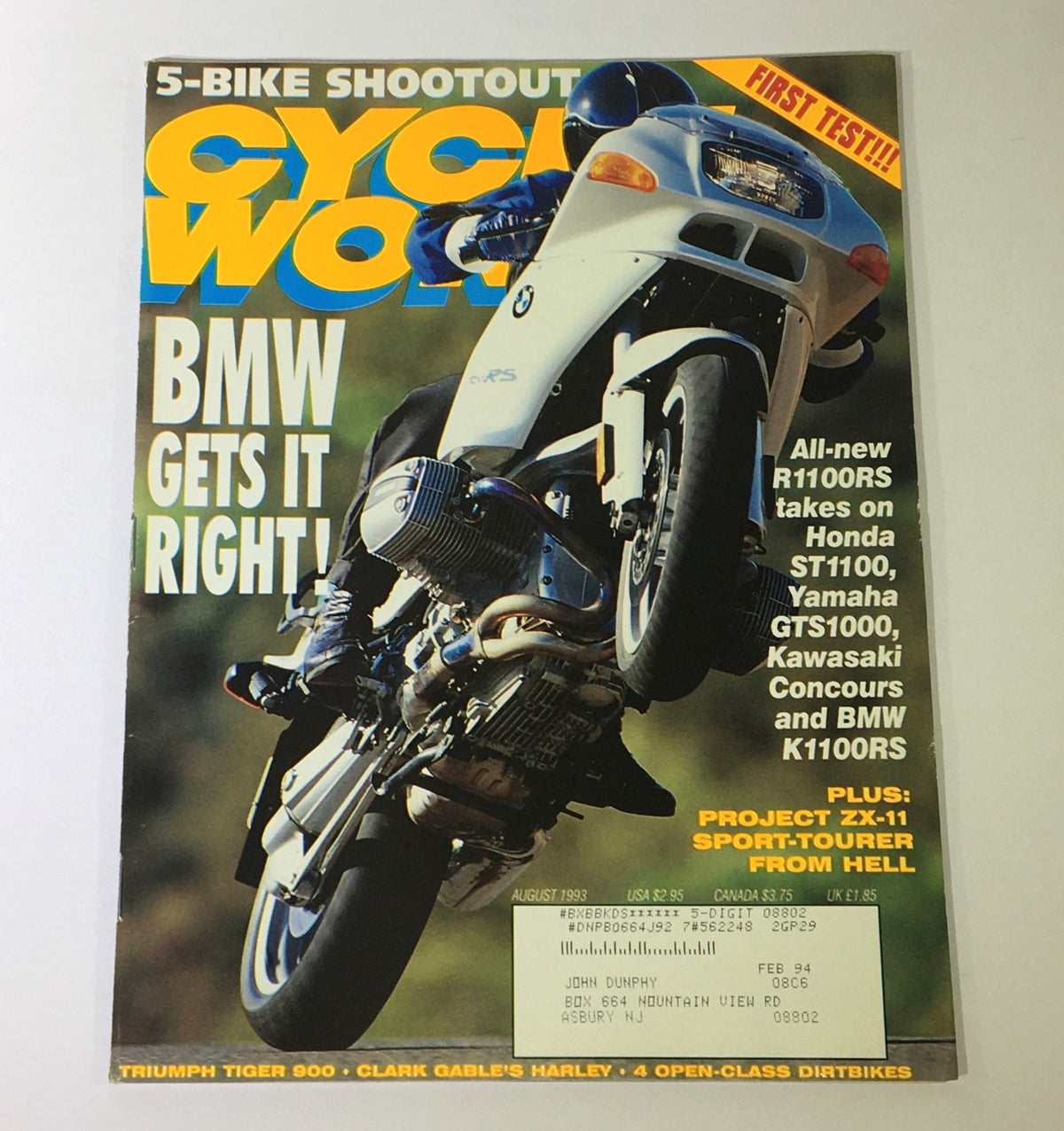 Cycle World Magazine August 1993 cover featuring a BMW motorcycle in action, highlighting the R1100RS model. The issue includes comparisons with Honda ST1100, Yamaha GTS1000 and other bikes, showcasing motorcycle technology and performance.