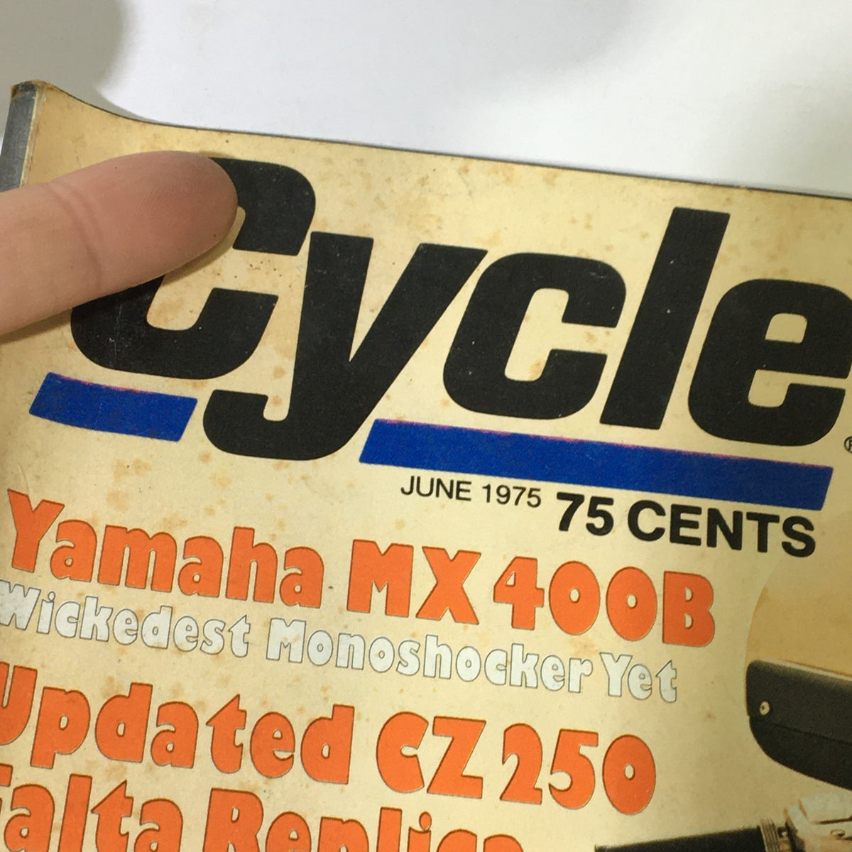 Close-up of the Vintage Cycle Magazine June 1975 cover, highlighting the Yamaha MX 400B and Updated CZ 250 Falta Replica, reflecting the era's motorcycle advancements.