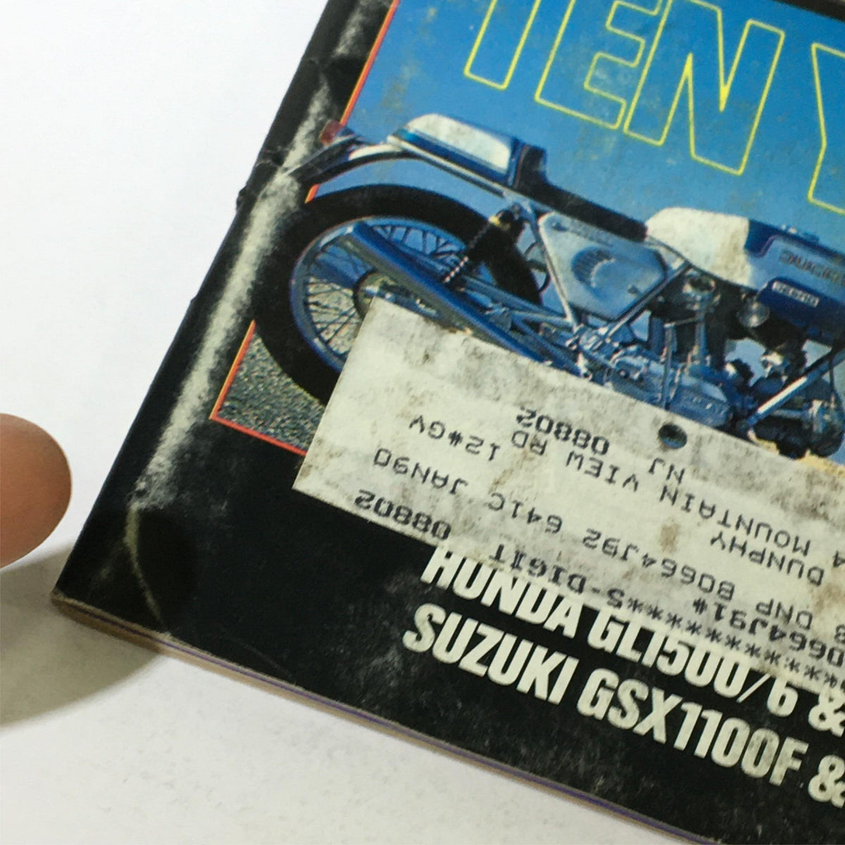 Close-up of the December 1988 Cycle Magazine cover showcasing the Honda GL1500/6 and Suzuki GSX1100F, featuring a vintage motorcycle image and an address label, reflecting the era's biking culture.