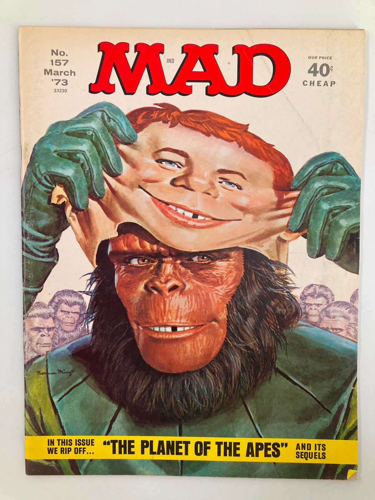 Cover of Mad Magazine March 1973 No. 157 featuring 'The Planet of The Apes' theme, depicting a character with an exaggerated smile holding a mask, surrounded by iconic apes from the film.
