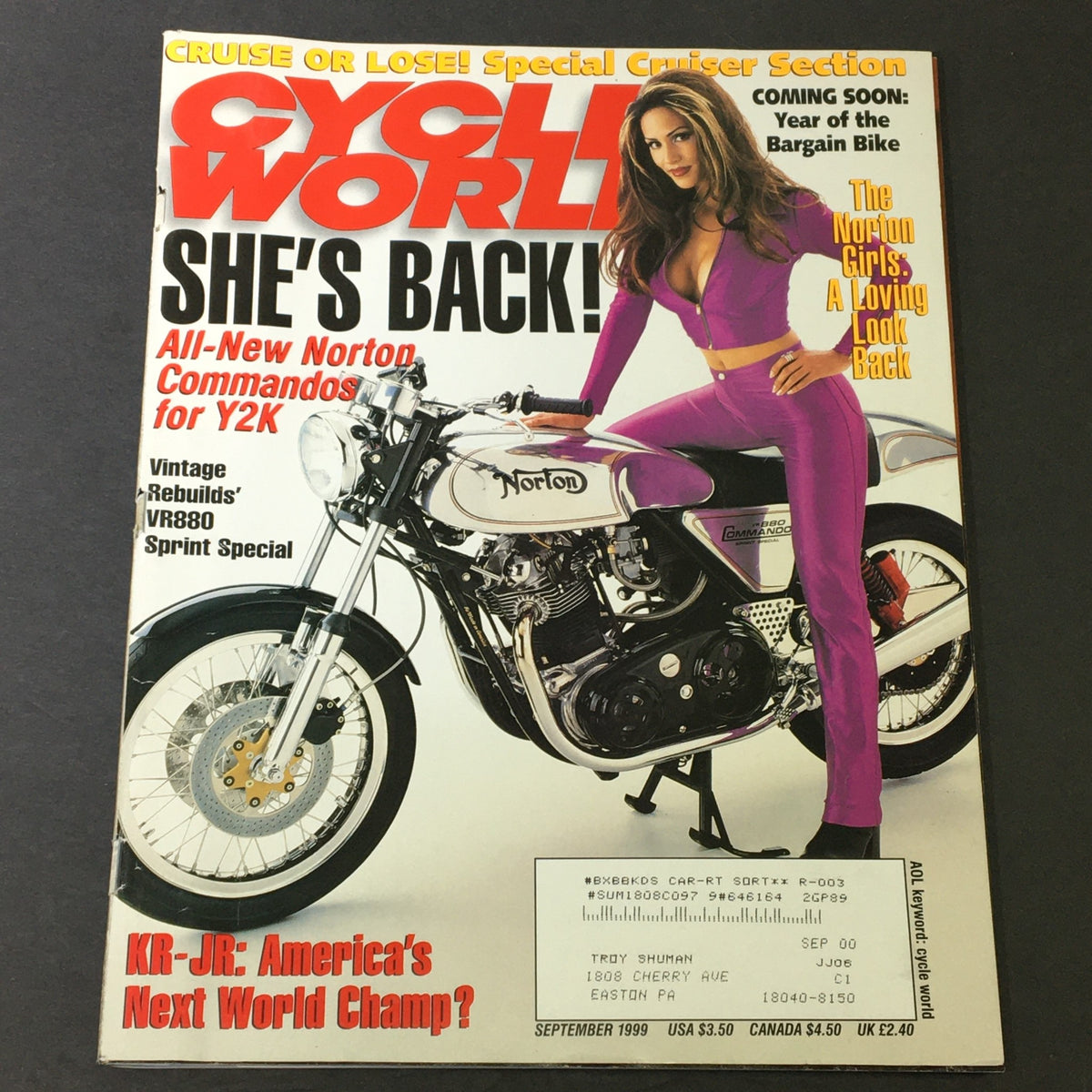 Cover of Cycle World Magazine September 1999 featuring Norton Commandos for Y2K with a model in a purple outfit next to a Norton motorcycle.