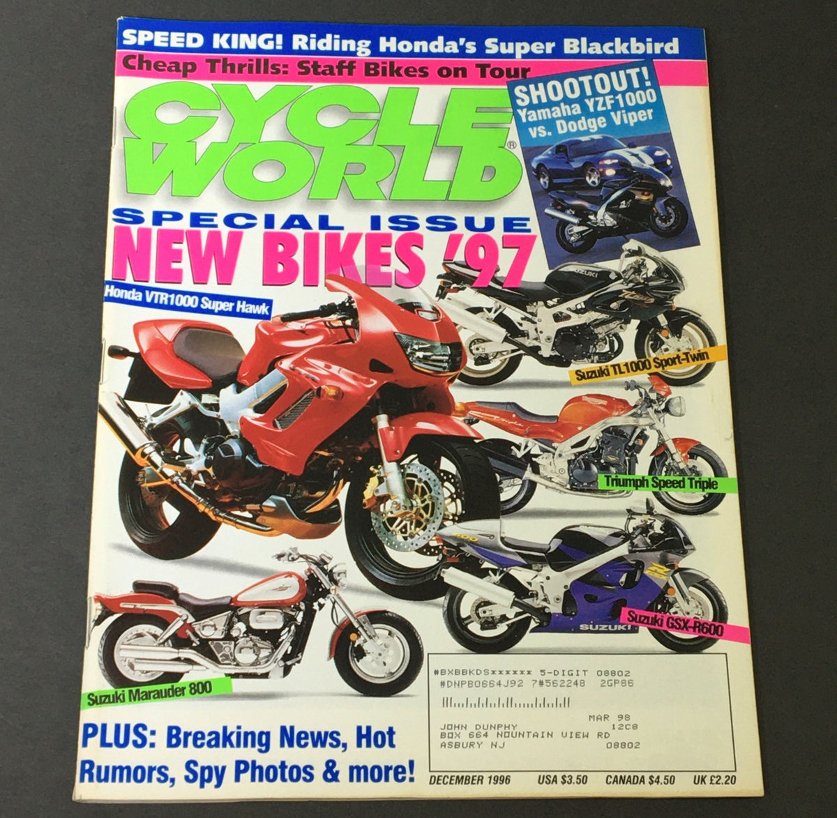 Cover of Cycle World Magazine December 1996 featuring the Honda VTR1000 Super Hawk and Suzuki TL1000. This special issue highlights new bikes for 1997 and includes articles on motorcycle news and reviews.