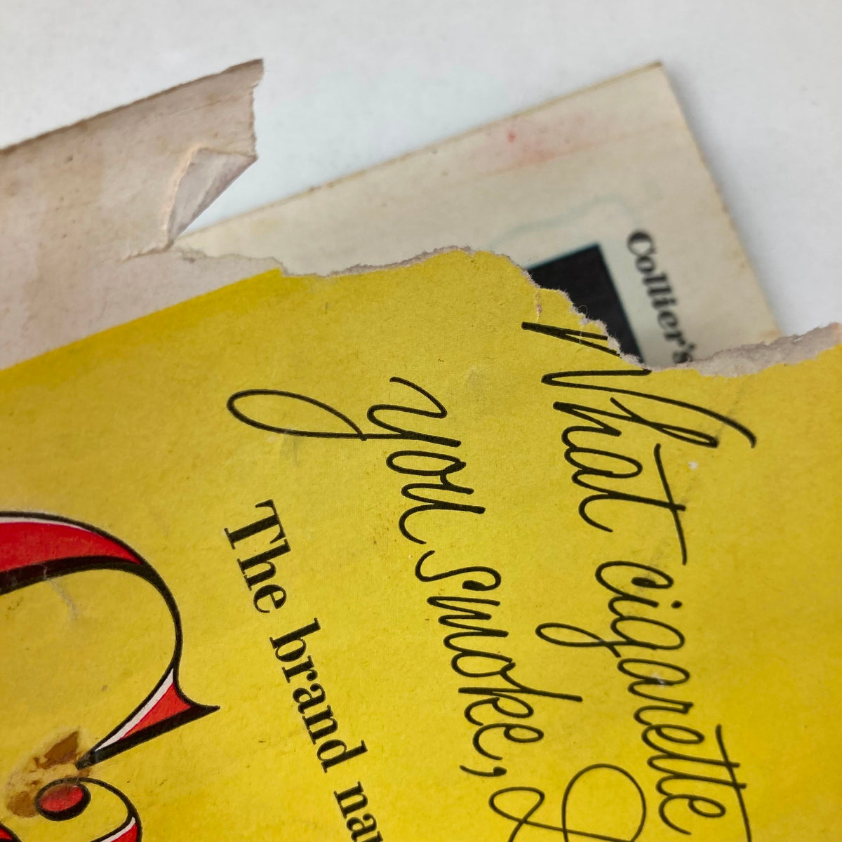 Close-up of the advertisement page in VTG Collier's Magazine December 1 1951, featuring vintage advertising text that highlights the cultural context of the era.