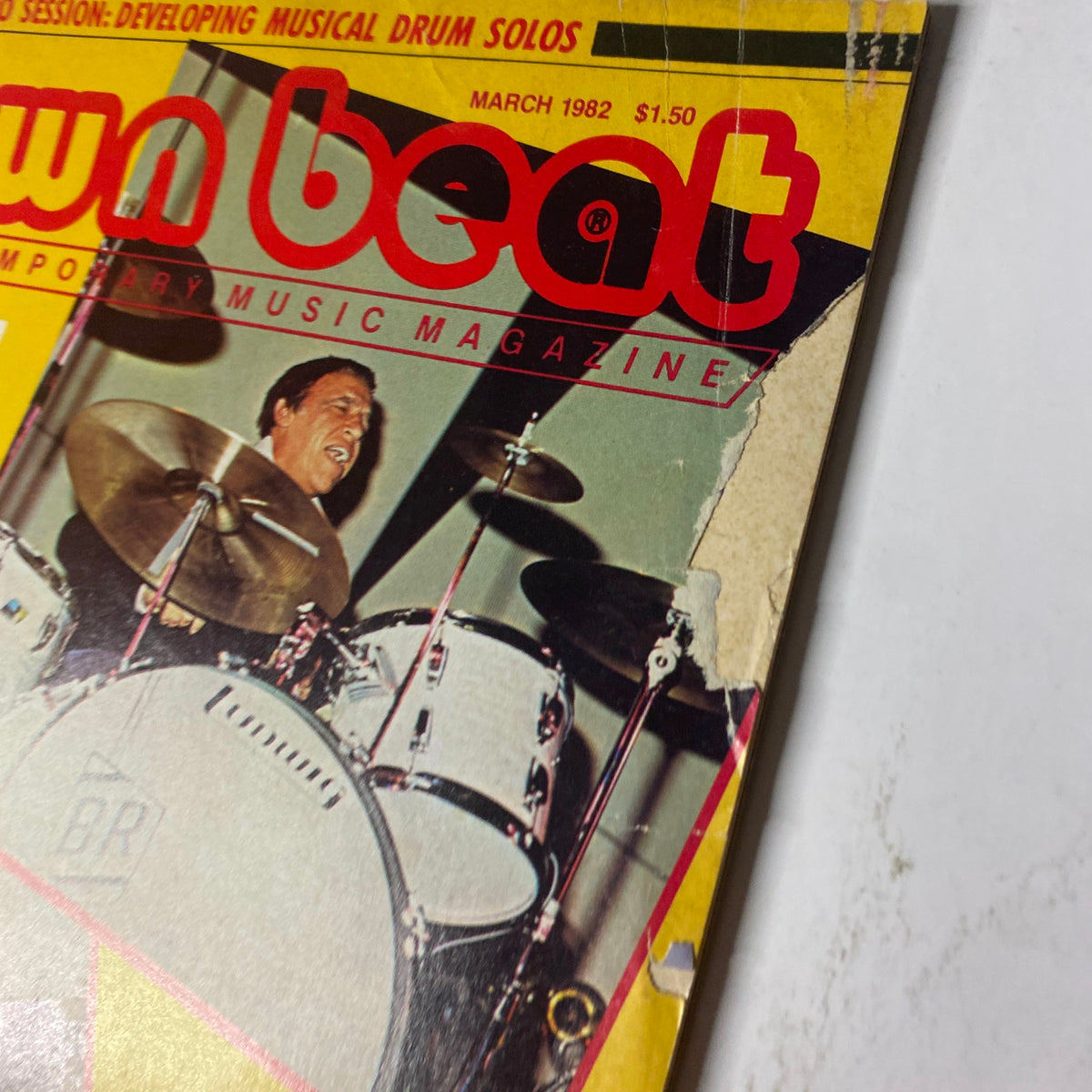 Close-up of the Down Beat Magazine March 1982 cover showcasing Buddy Rich performing with drums.