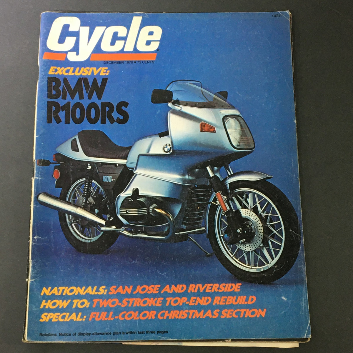 Cover of the VTG Cycle Magazine December 1976 featuring the BMW R100RS motorcycle, highlighting articles on two-stroke engine rebuilding and classic motorcycle culture.