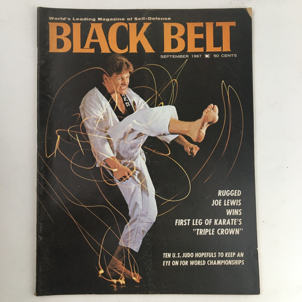 Cover of Black Belt Magazine, September 1967, Vol. 5 No. 9, featuring Joe Lewis showcasing a karate kick, emphasizing the issue's focus on martial arts history.