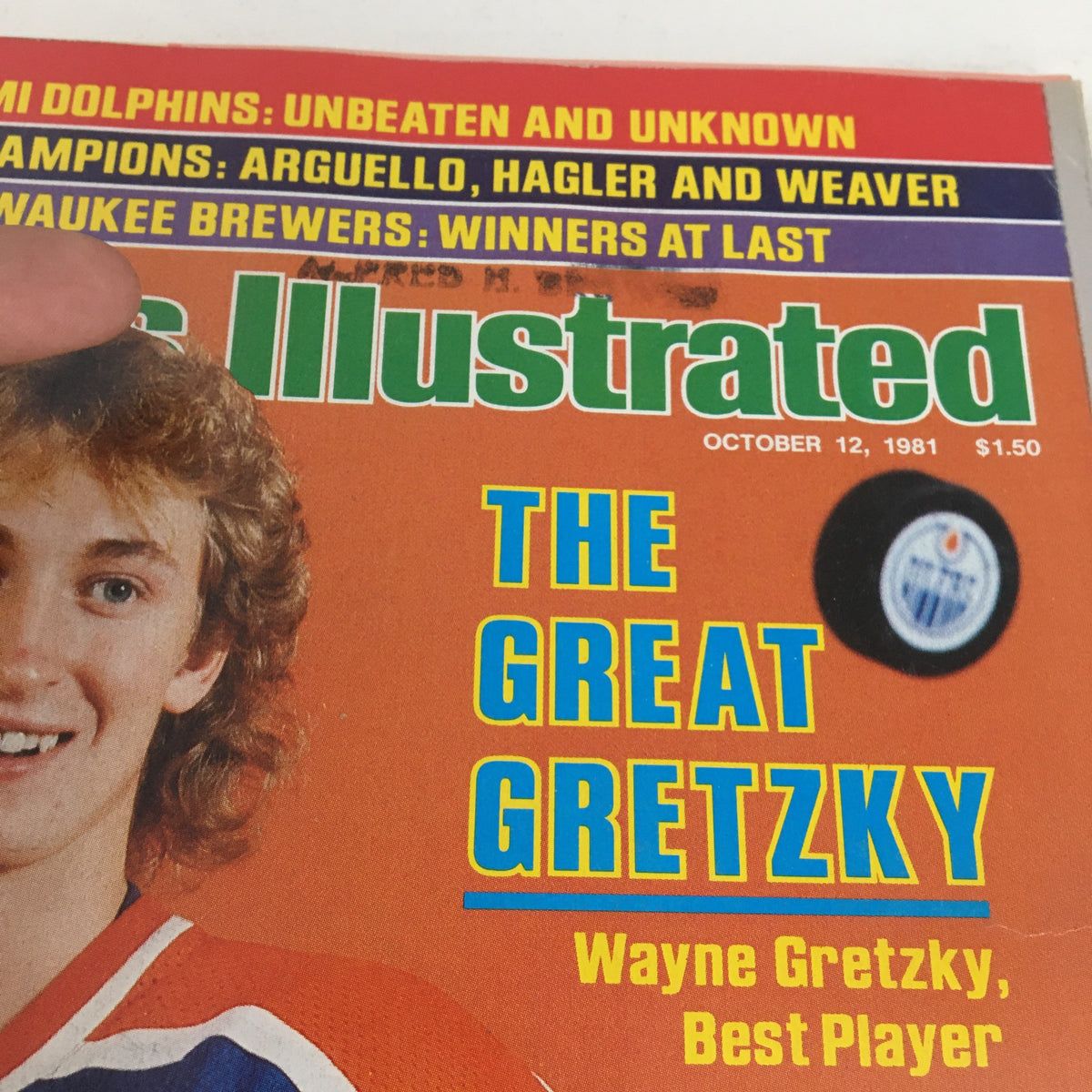 Close-up of the cover of Sports Illustrated Magazine, October 12, 1981, showcasing Wayne Gretzky's photo and the title 'THE GREAT GRETZKY' along with the tagline 'Wayne Gretzky, Best Player', emphasizing his legendary hockey career.