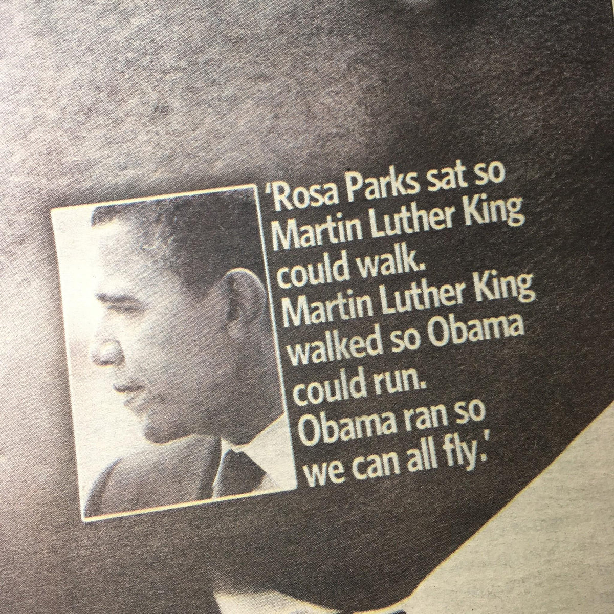 Close-up of a Newsday article from January 19, 2009, featuring a quote that highlights the legacy of Martin Luther King Jr. and the achievements of Barack Obama as the first African American president.